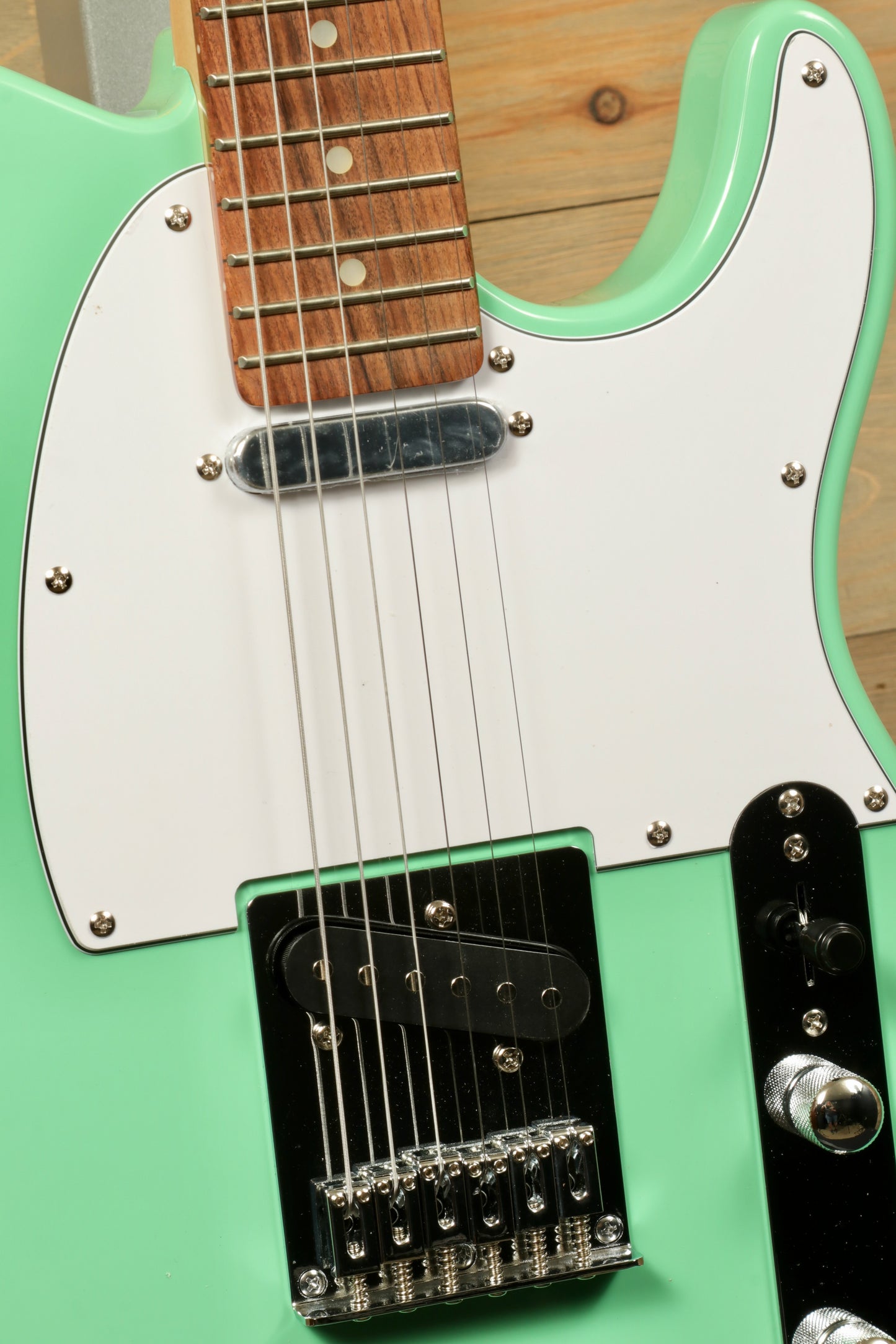 Tagima electric guitar guitars, mint green finish, front view showing body and neck details