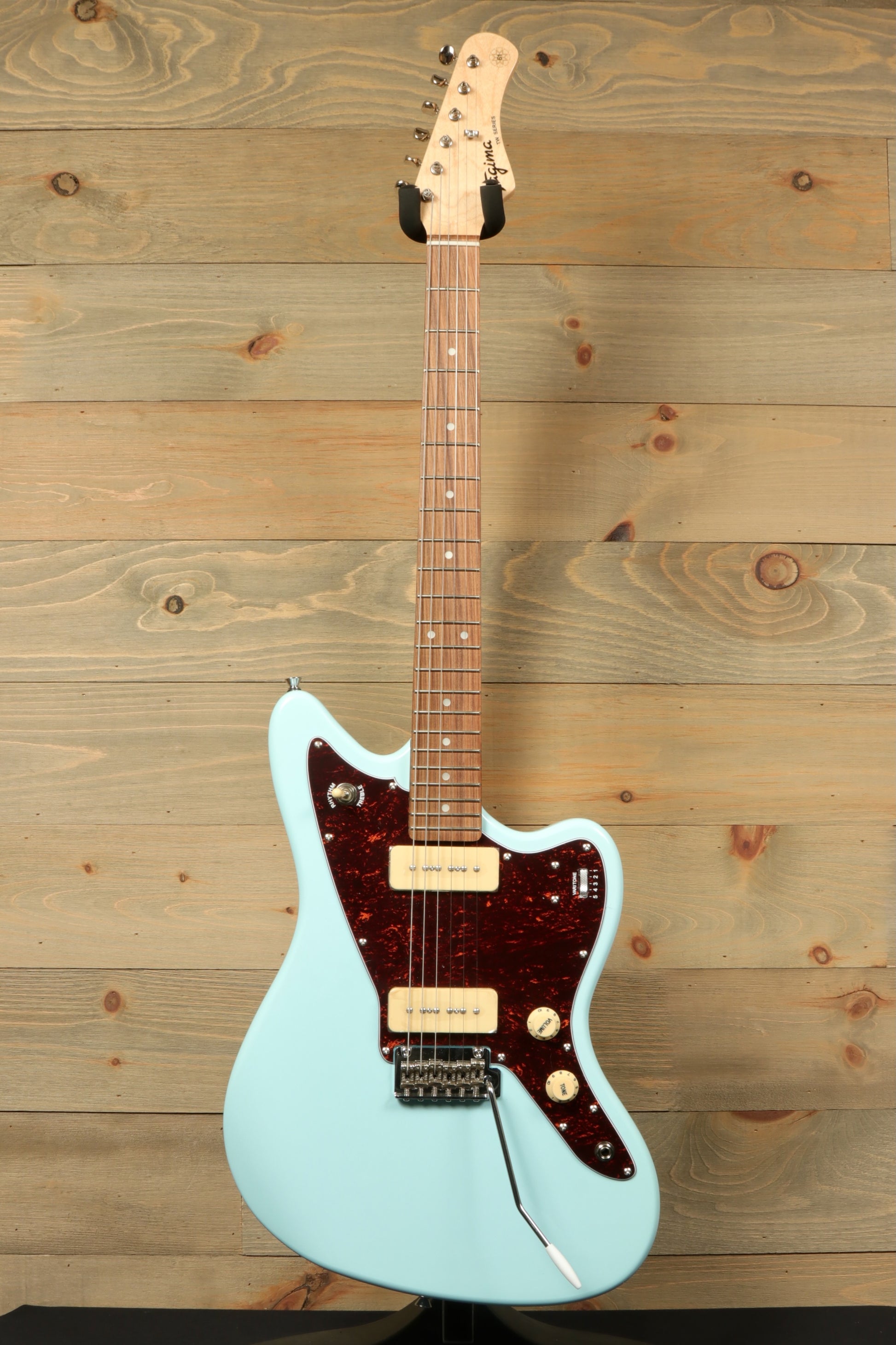Tagima Jazz Electric Guitar in pastel blue with a tortoiseshell pickguard, front view