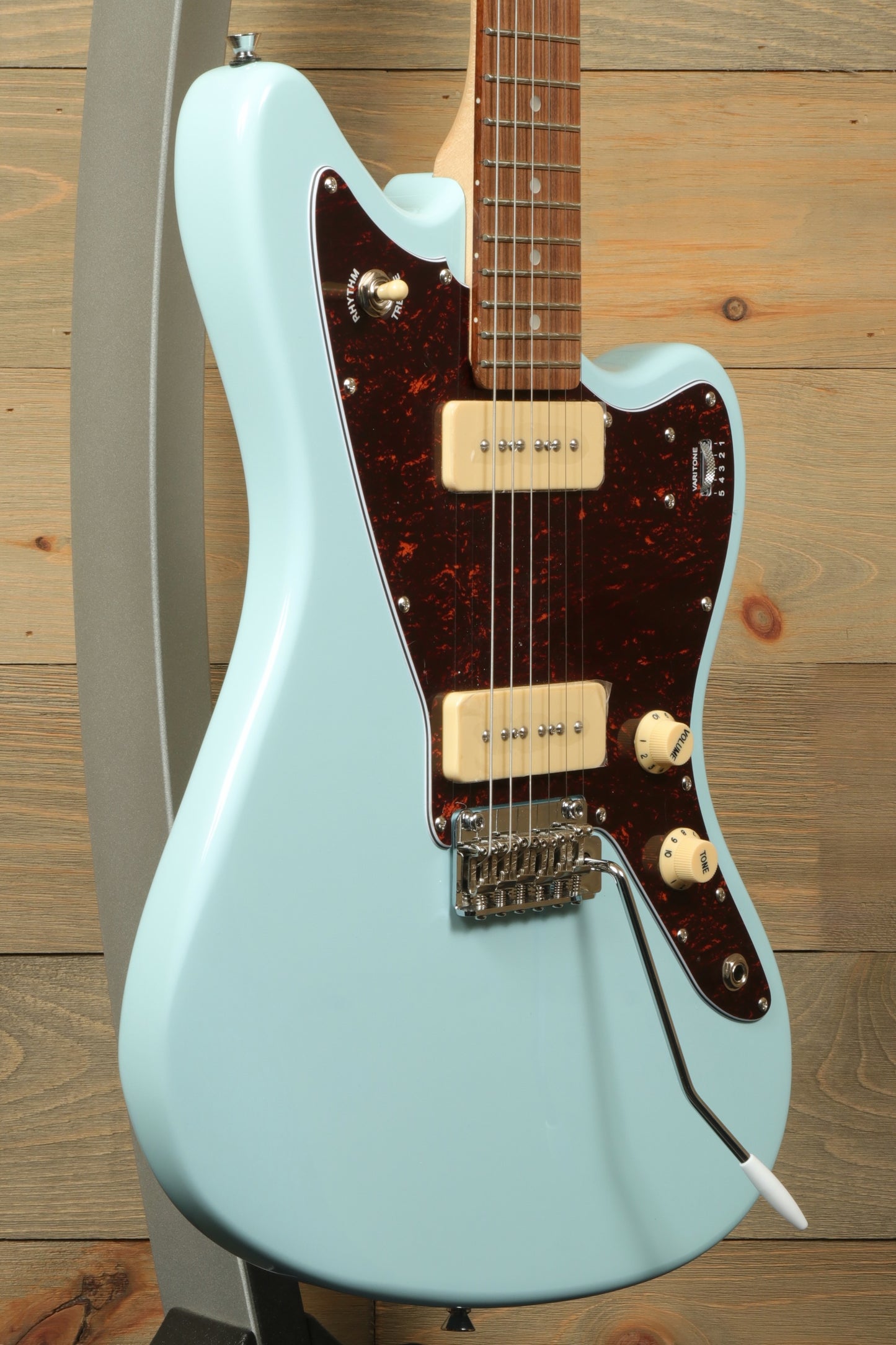 Tagima Jazz Electric Guitar in light blue with tortoise shell pickguard, side view