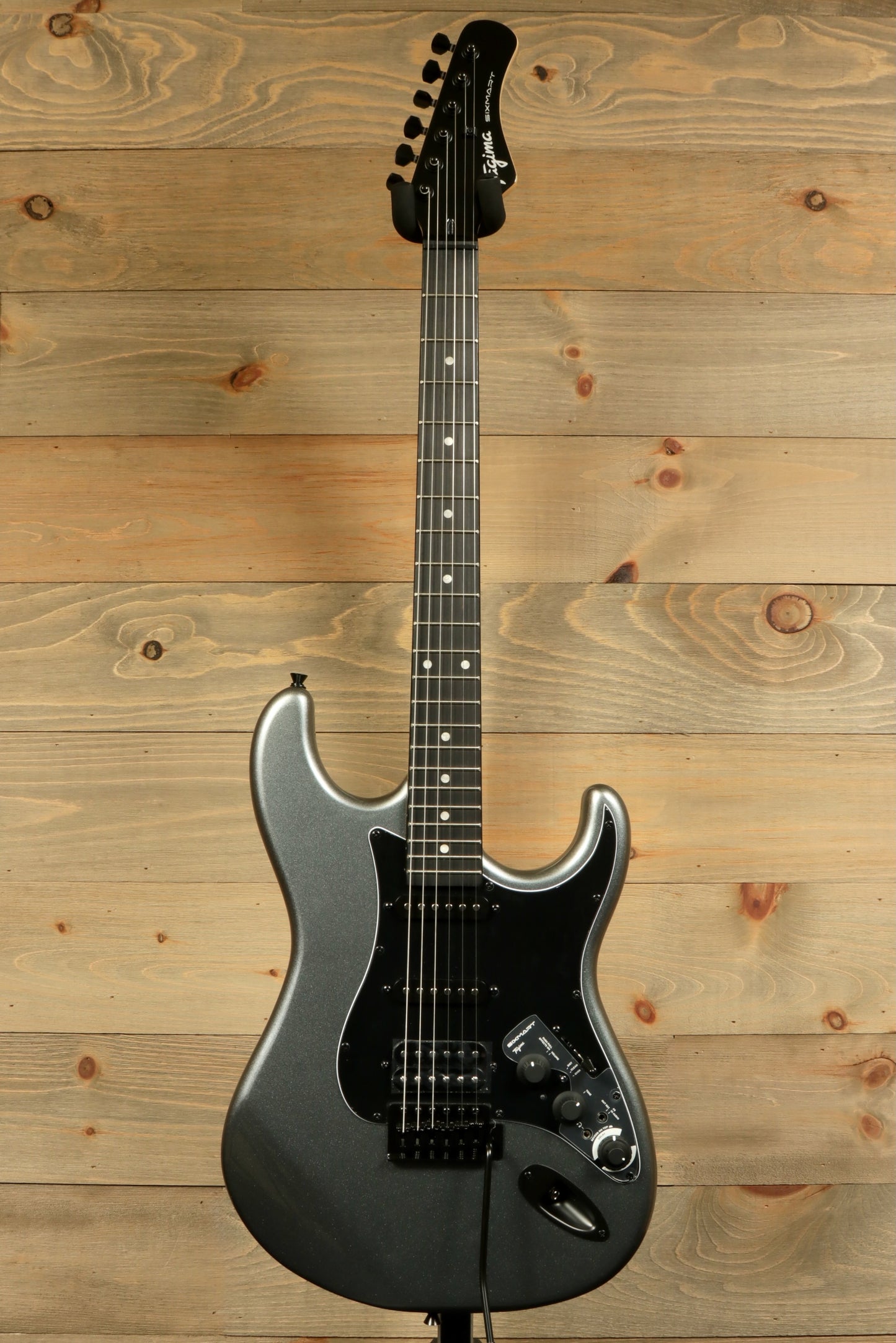 Tagima Sixmart electric guitar in metallic gray finish with sleek design and versatile features
