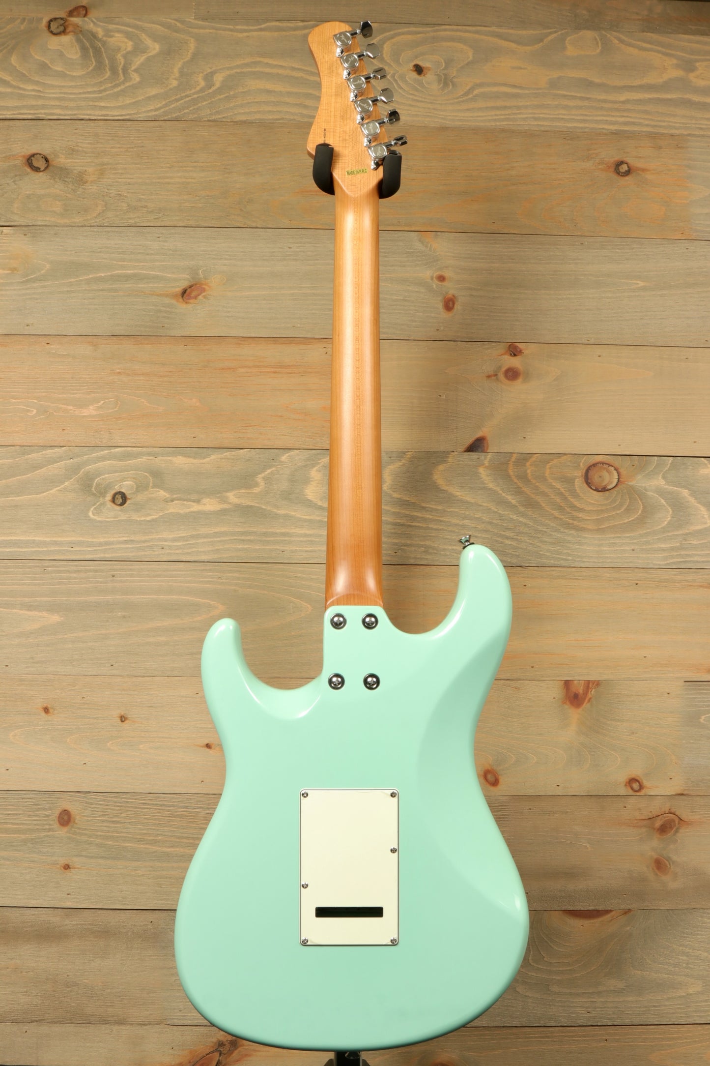 Tagima T 640 SUPER electric guitar in mint green, back view showcasing the sleek design