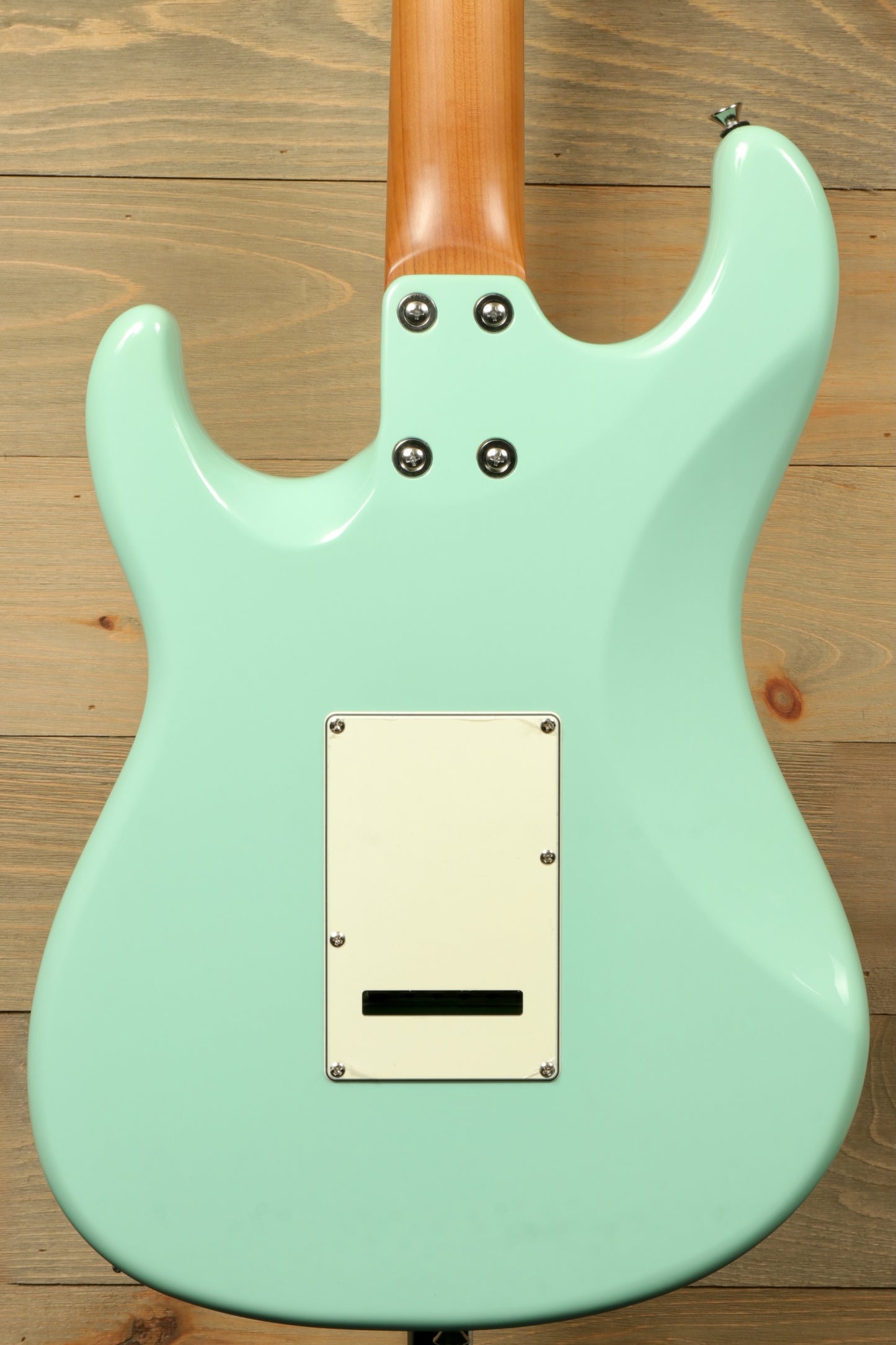 Tagima T 640 SUPER electric guitar in mint green, back view showcasing smooth finish
