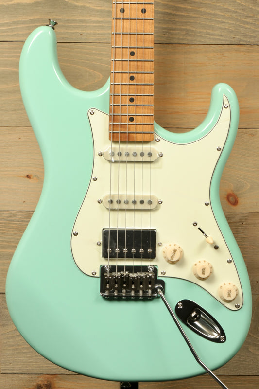 Tagima T 640 SUPER electric guitar in mint green, front view with three pickups and vintage knobs