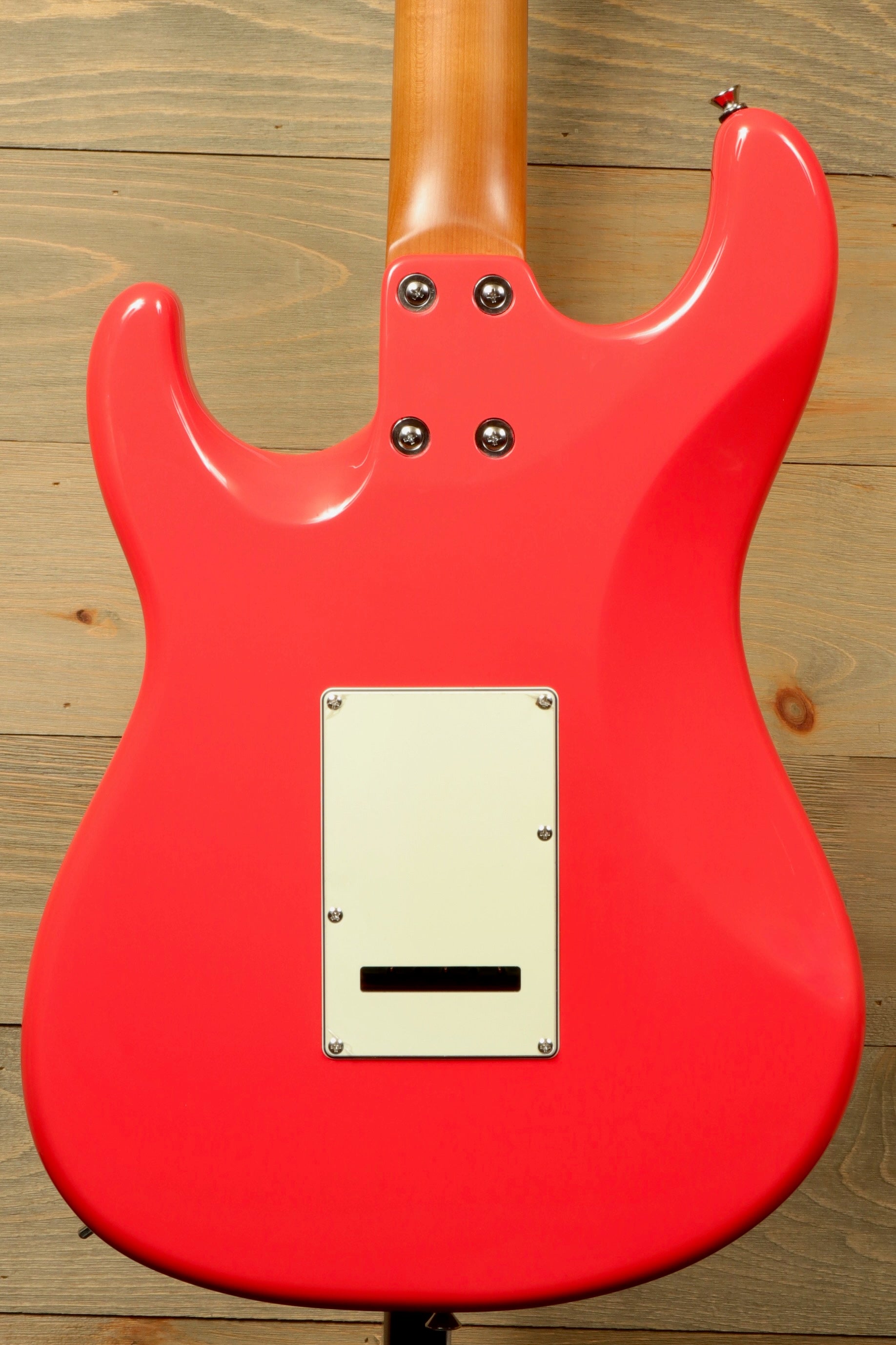 Tagima T 640 SUPER electric guitar in bright red, back view showcasing the body and control plate