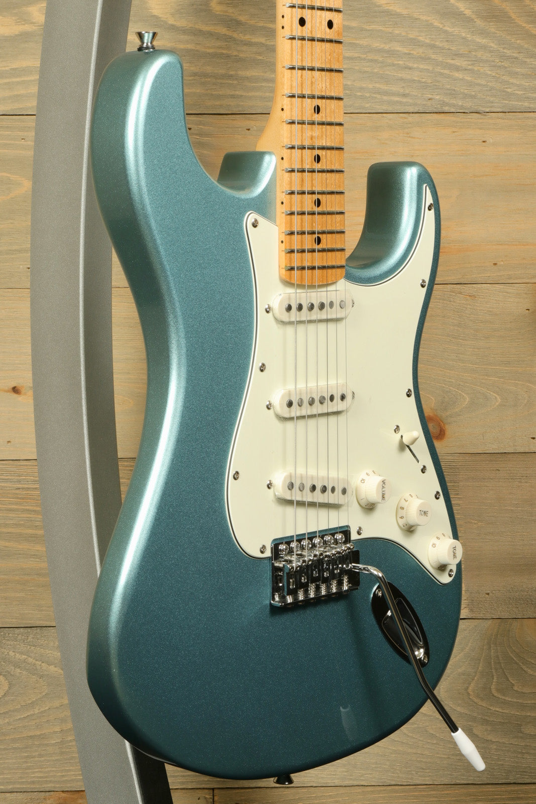 Tagima TG 530 electric guitar in blue metallic finish with a maple neck and white pickguard