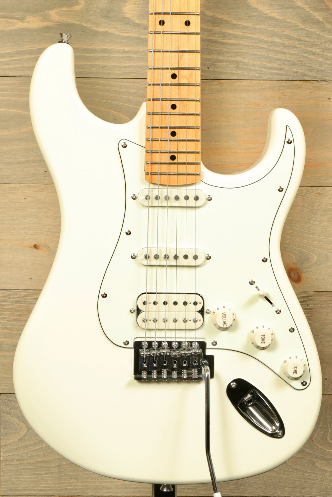 Tagima TG 540 electric guitar in white with a maple neck and sleek design features
