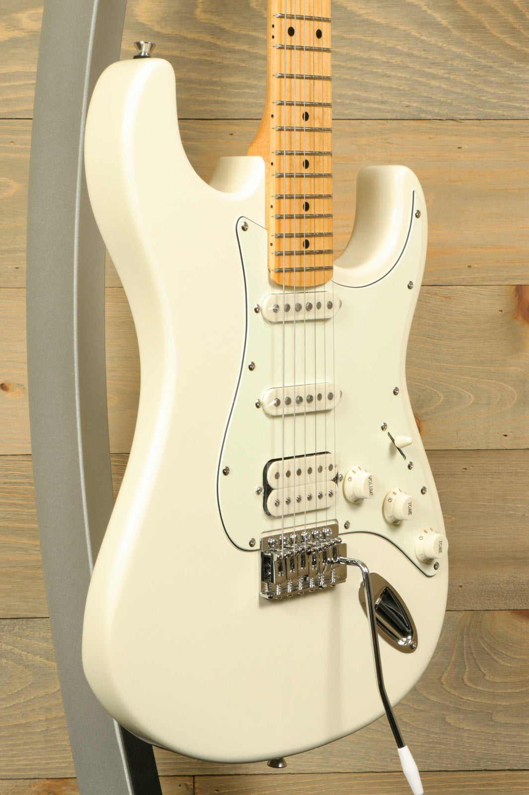 Tagima TG 540 electric guitar in white with maple neck and three single-coil pickups