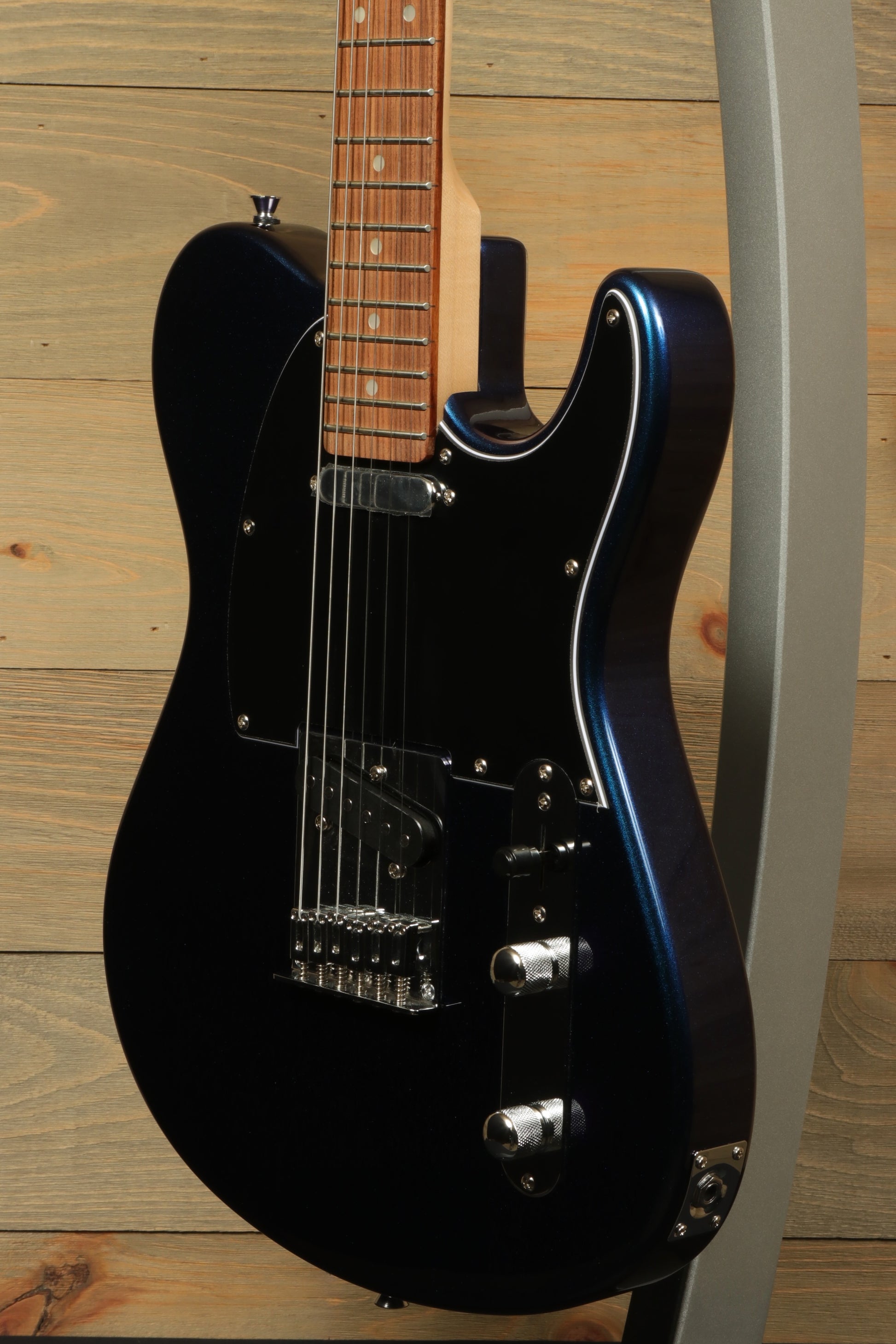 Tagima TW 55 MCBL/BK Electric Guitar in Midnight Black, side view showcasing design and features
