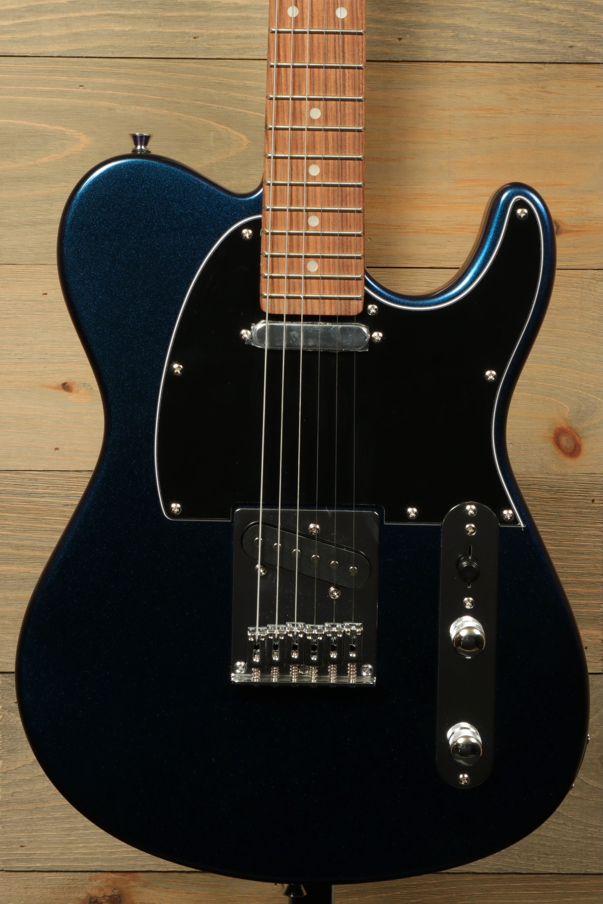 Tagima TW 55 MCBL/BK Electric Guitar in metallic blue with a glossy finish, front view