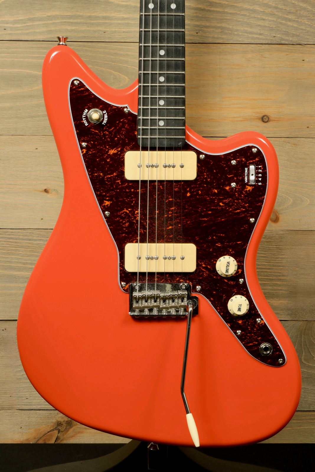 Tagima TW 61 Fiesta Red Electric Guitar with Unique Body Shape and Dual Pickups