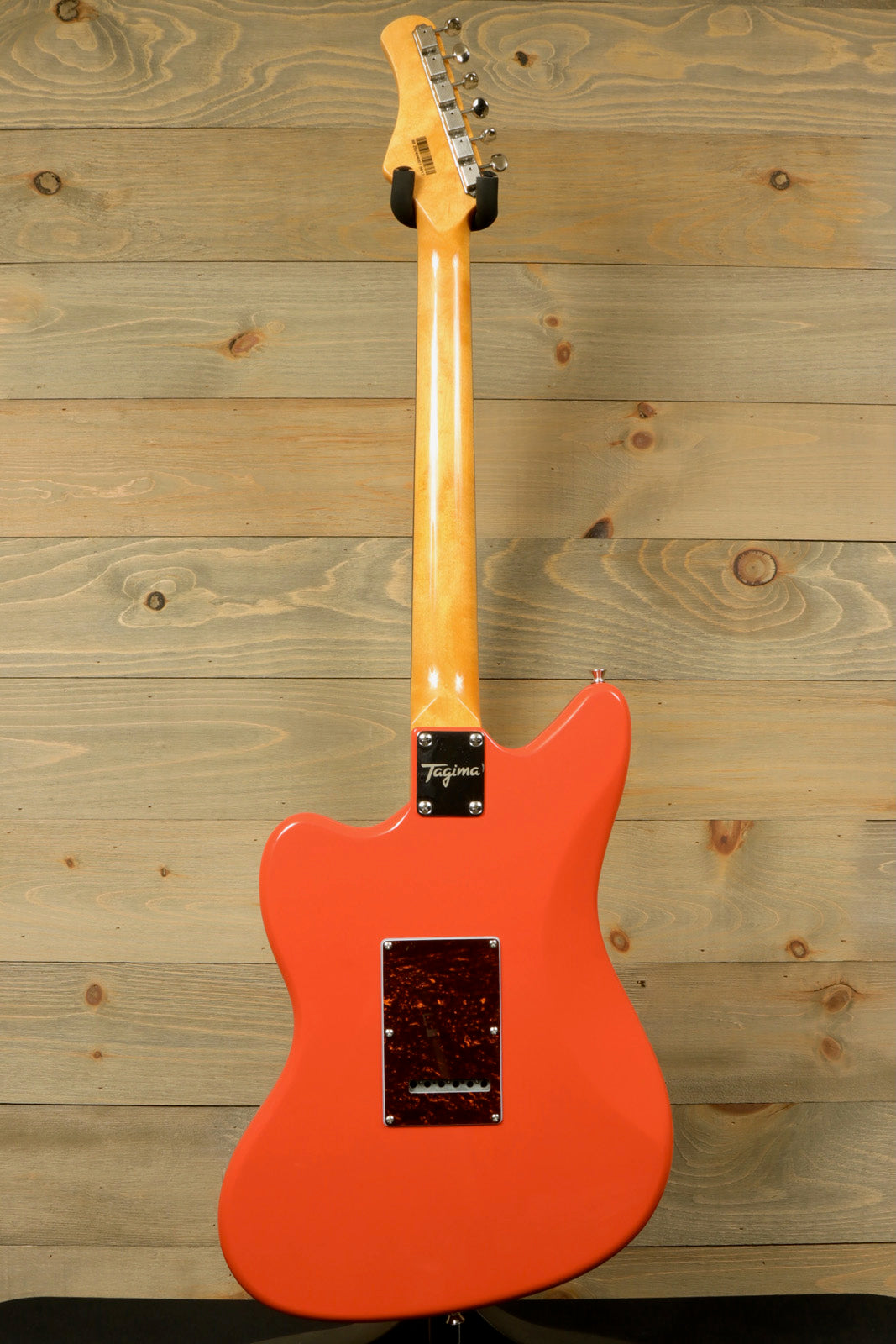 Tagima TW 61 Fiesta Red Electric Guitar with a sleek body and beautiful finish