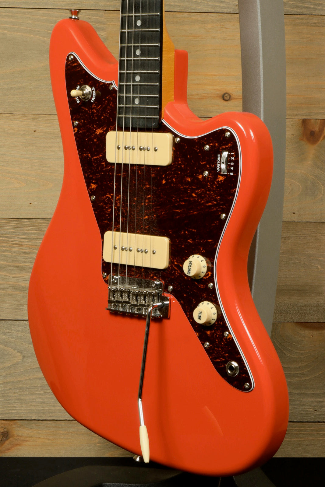 Tagima TW 61 Fiesta Red Electric Guitar with a unique design and vintage-style pickups