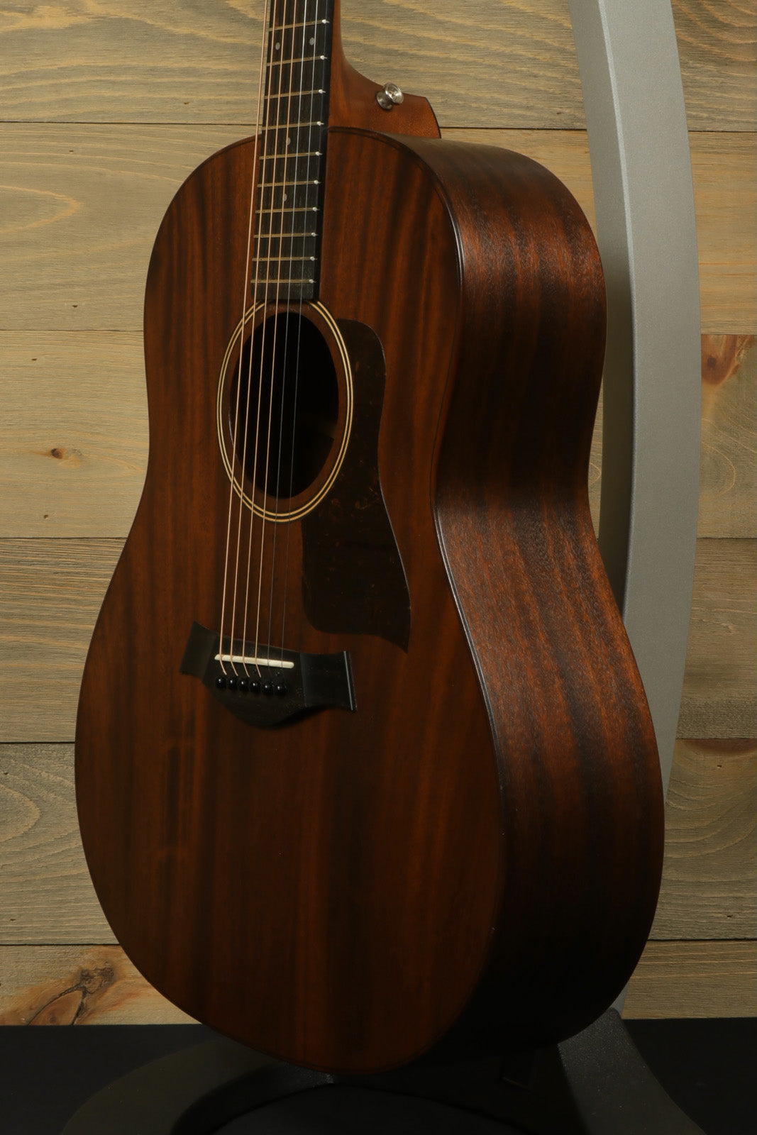Taylor AD27e acoustic electric guitar in mahogany finish with Aerocase, side view