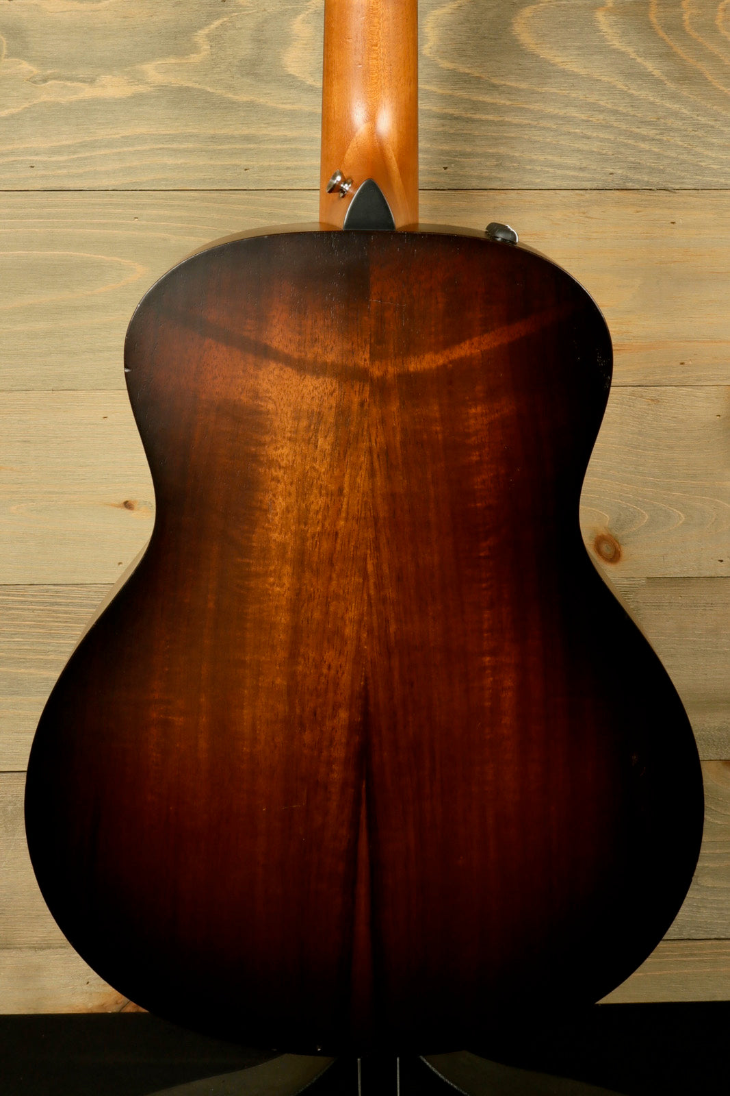 Taylor GS Mini-e Koa acoustic electric guitar with a beautiful sunburst finish, back view
