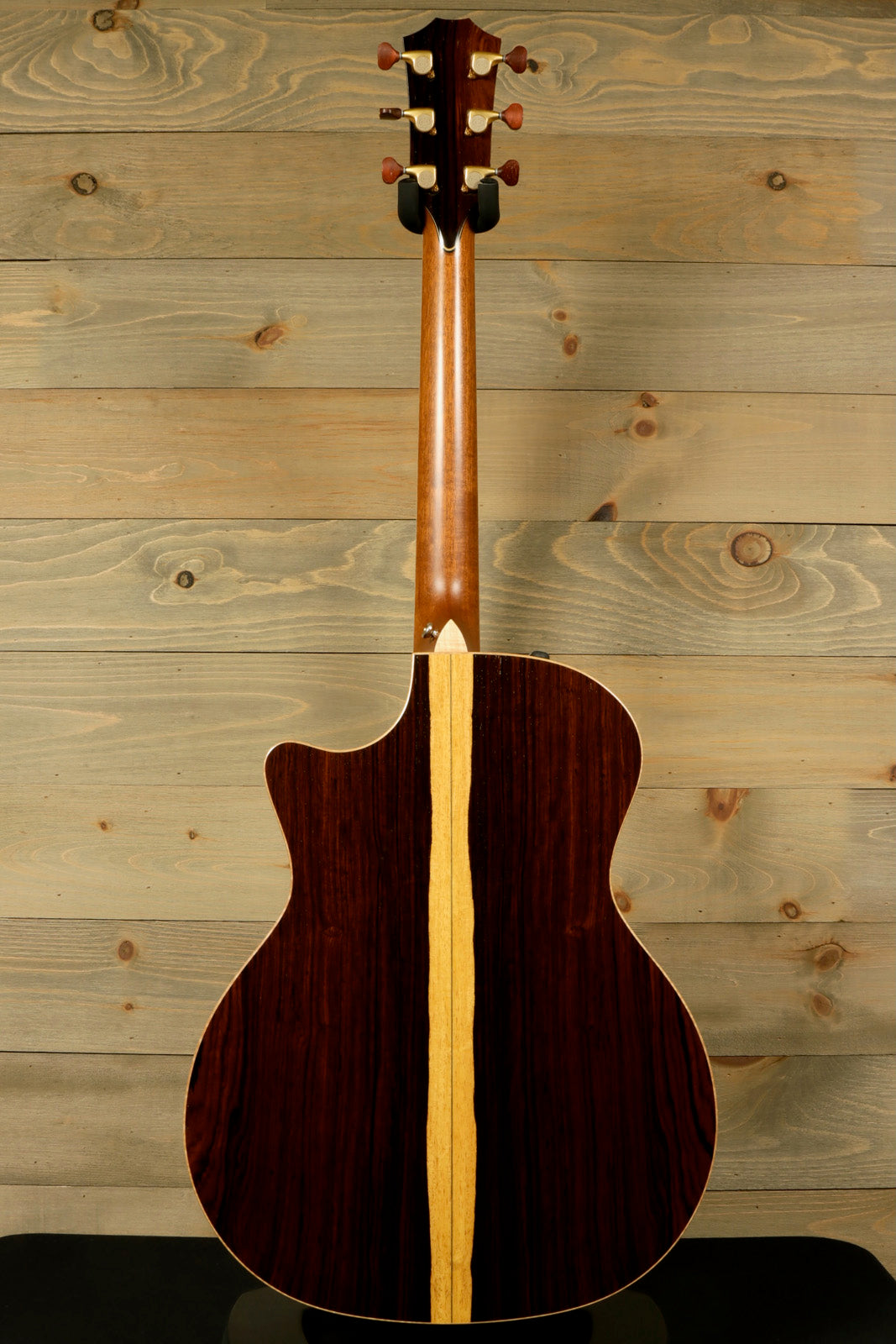 Used Taylor Cocobolo GA LTD guitar with a stunning back design showcasing unique wood grain and coloring