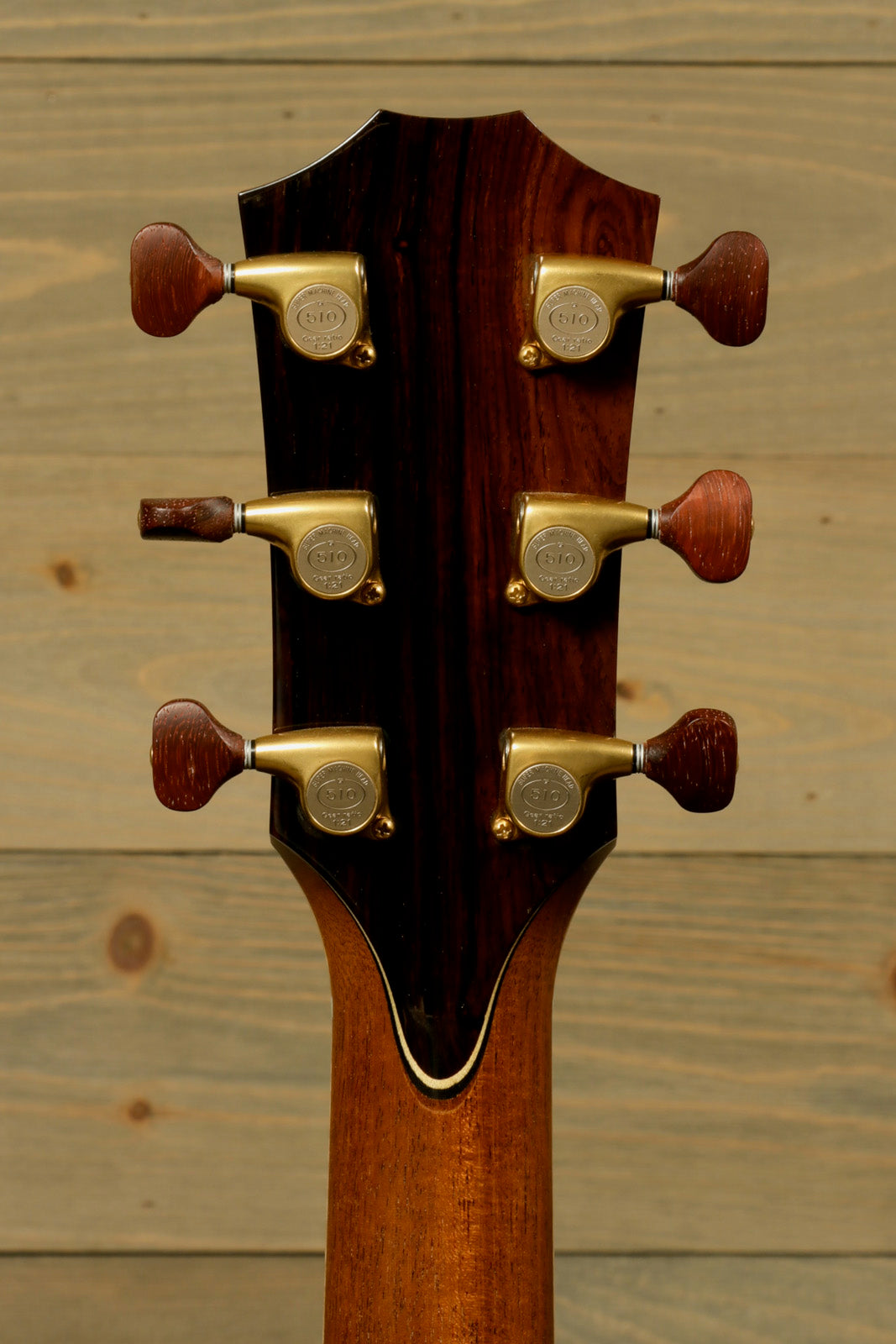 Used Taylor Cocobolo GA LTD guitar headstock with premium tuning pegs and sleek wood finish