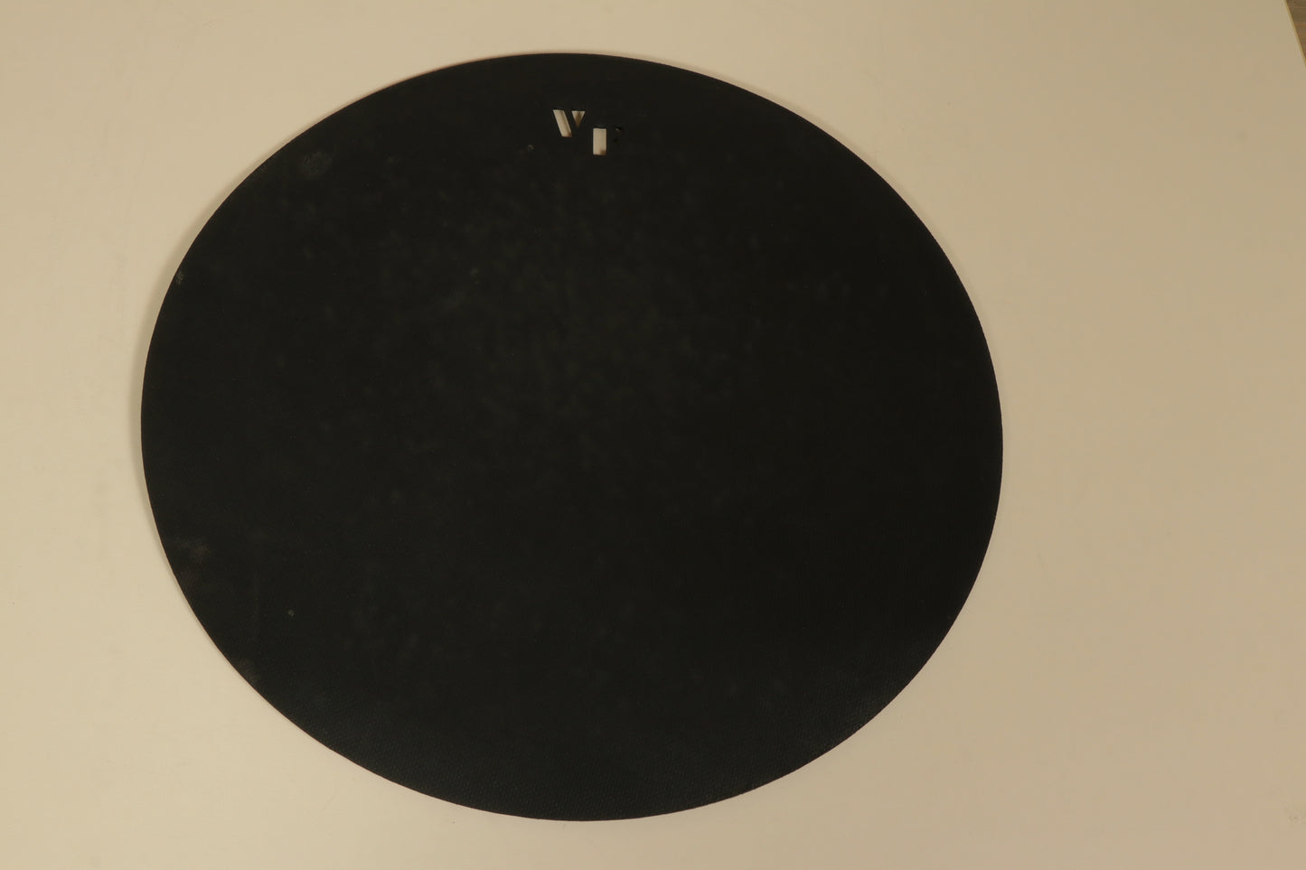 Used Vic Firth practice pad offering a durable surface for drumming exercises and rhythm training