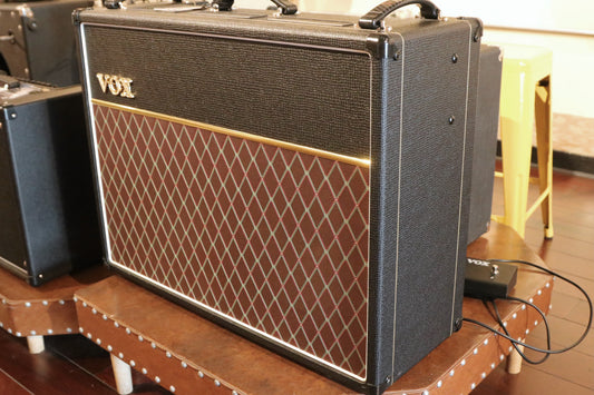Vox AC15C2 2x12 Combo amplifier, black and brown with diamond grille, angled side view