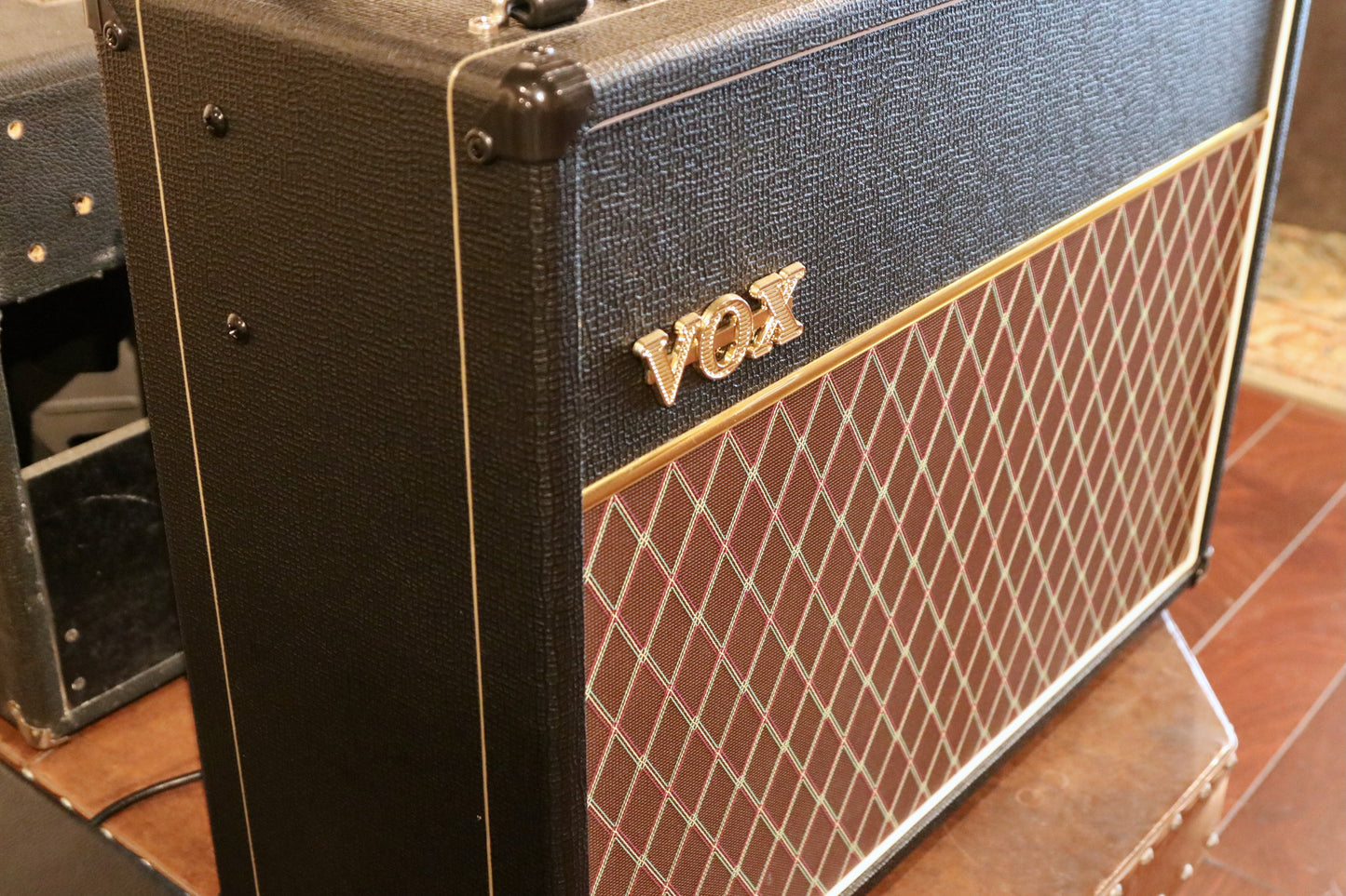 Vox AC15C2 2x12 Combo amplifier, black with classic diamond grille pattern, side view