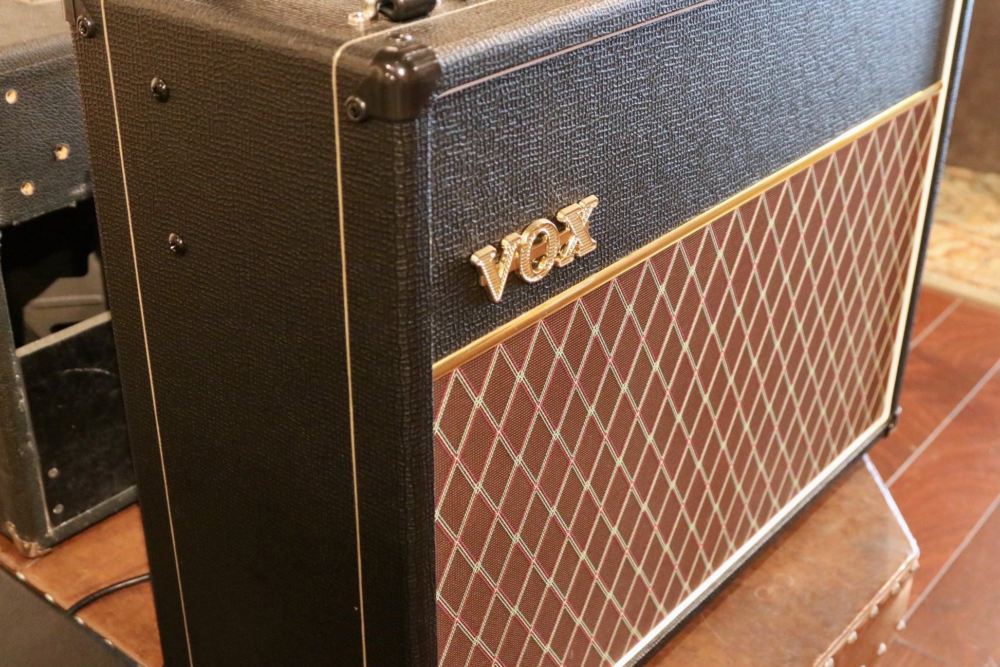 Vox AC15C2 2x12 Combo amplifier, black with classic diamond grille pattern, side view