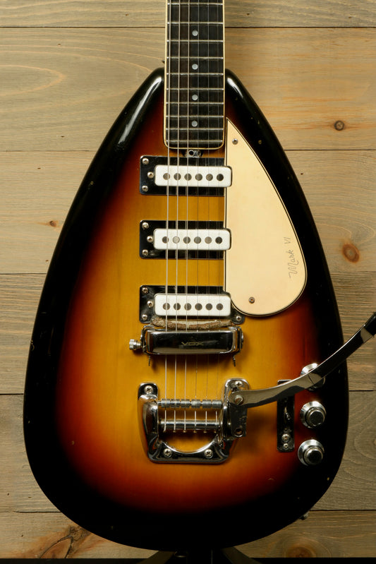 Rare Vintage Vox Guitar in sunburst finish, front view showcasing unique design and pickups