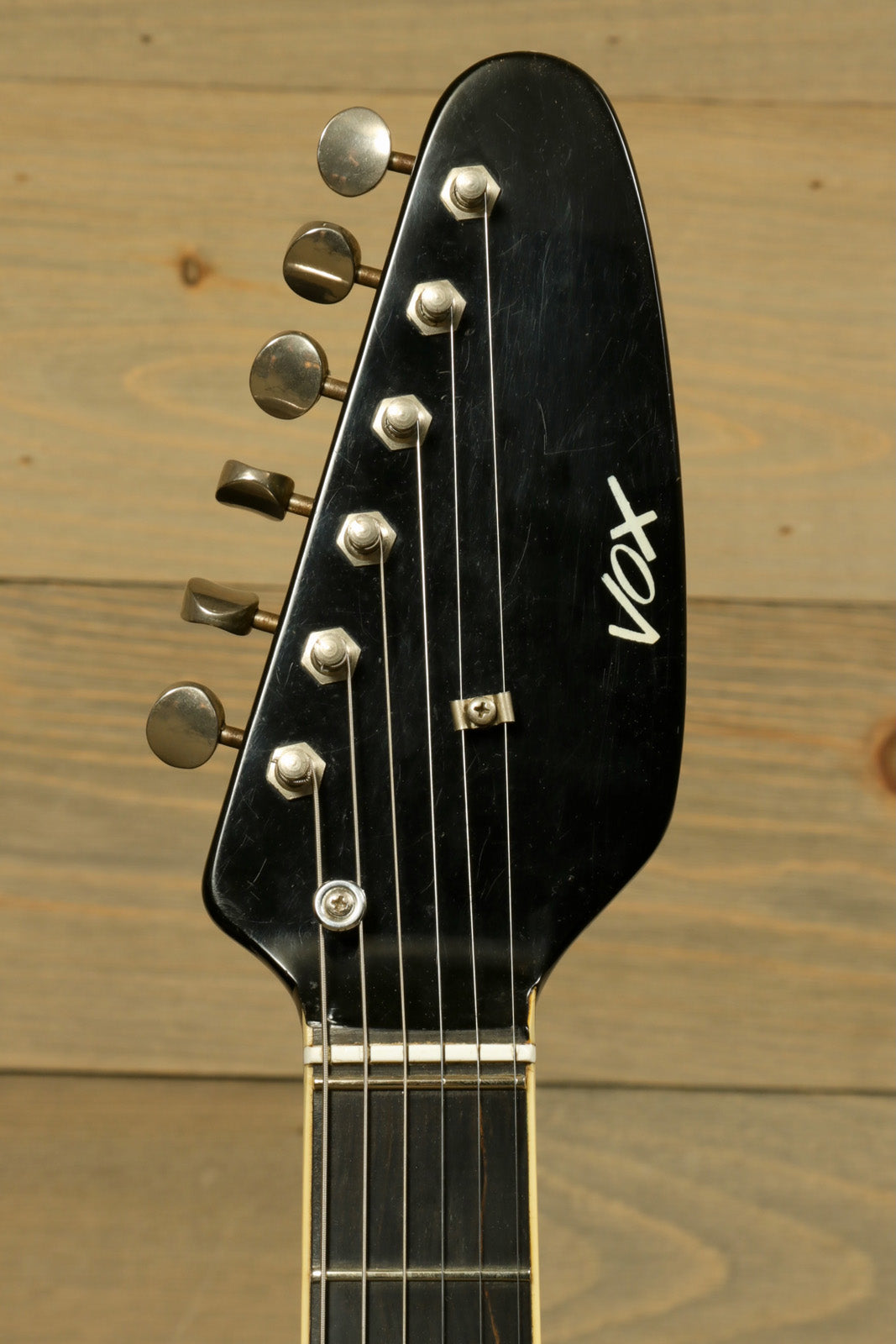 Rare Vintage Vox Guitar, black headstock with tuning pegs, front view