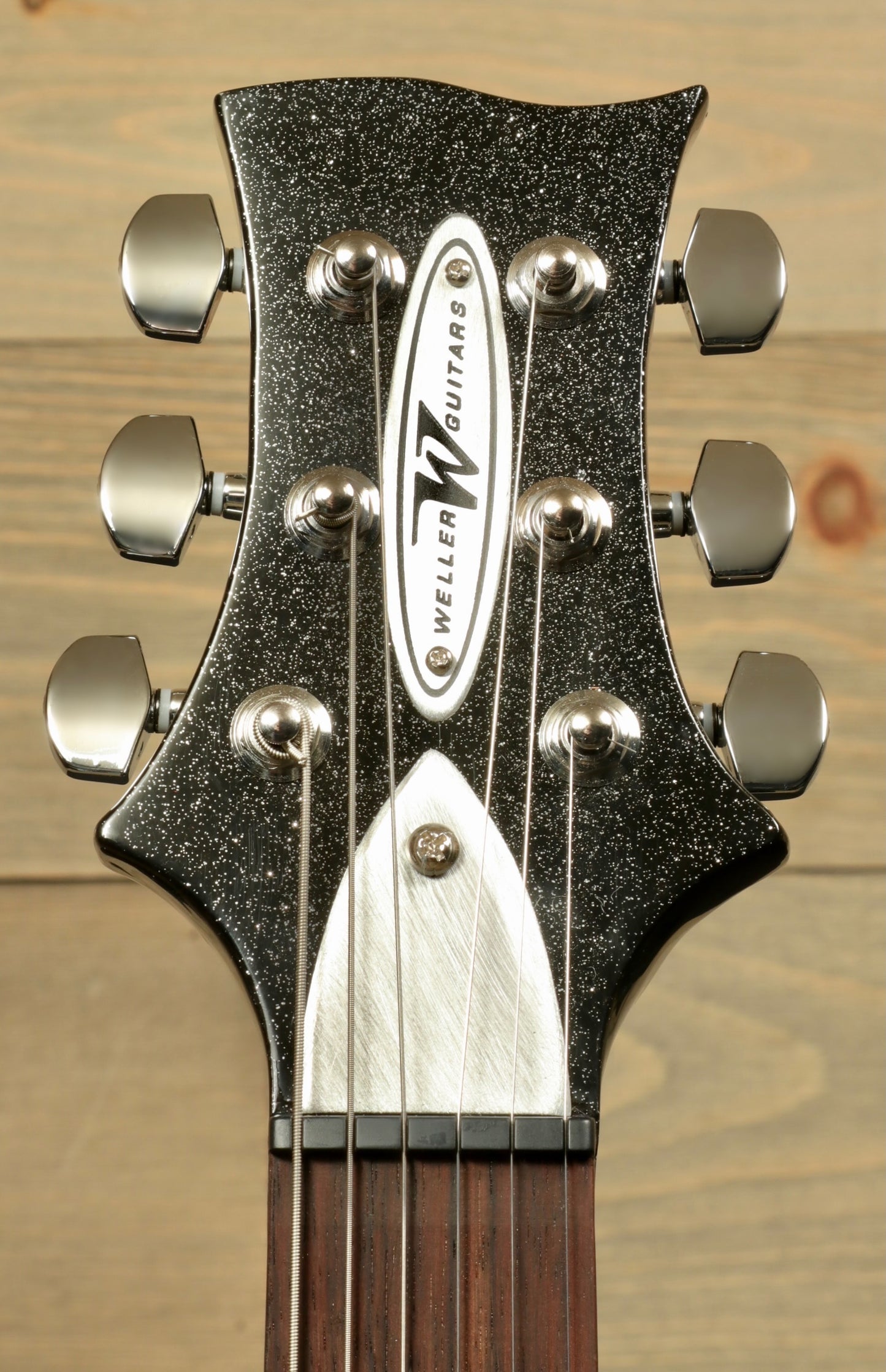 Weller Fleetwood Tremolo electric guitar, black sparkle finish, headstock view