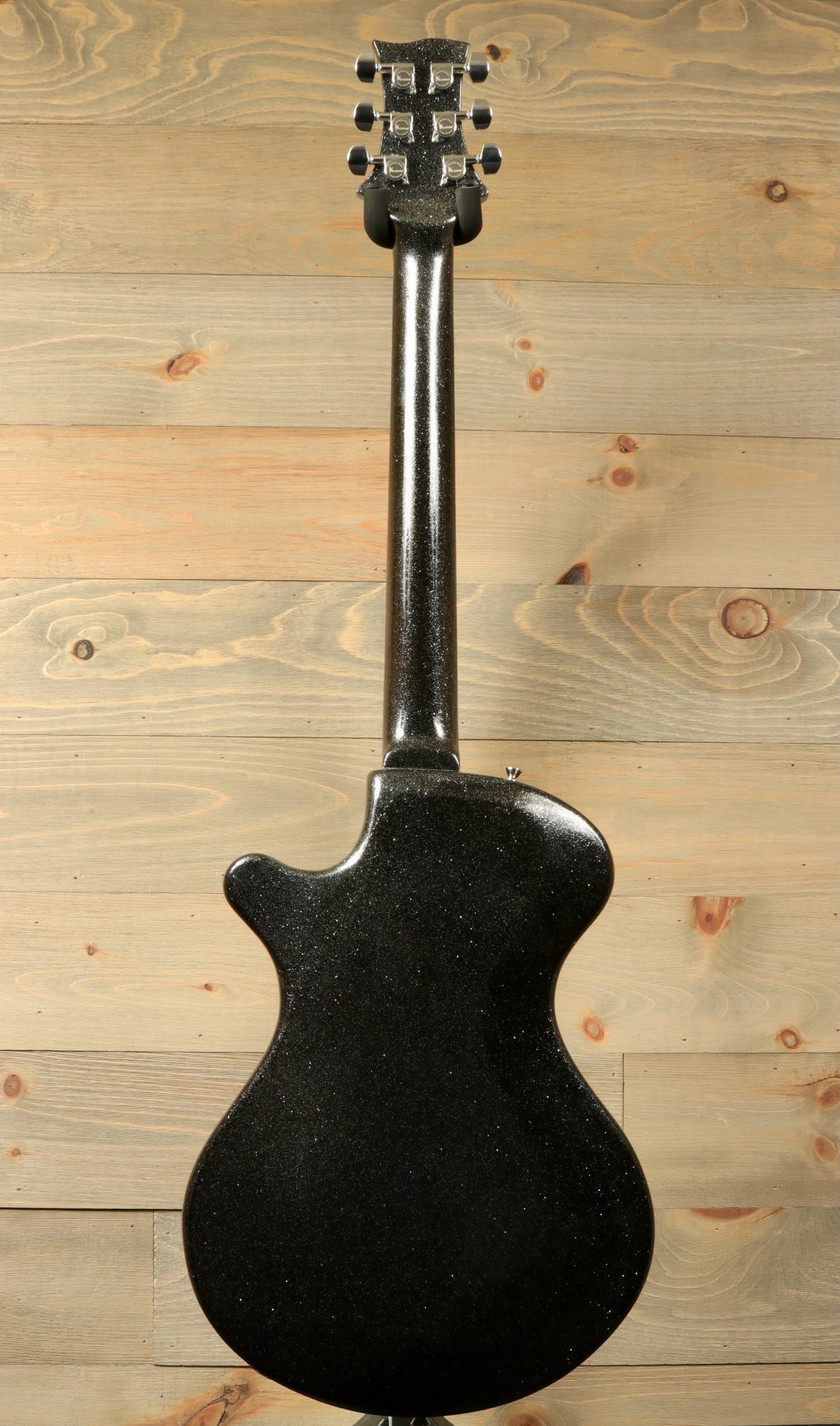 Weller Fleetwood Tremolo electric guitar in black, back view showcasing the sleek finish