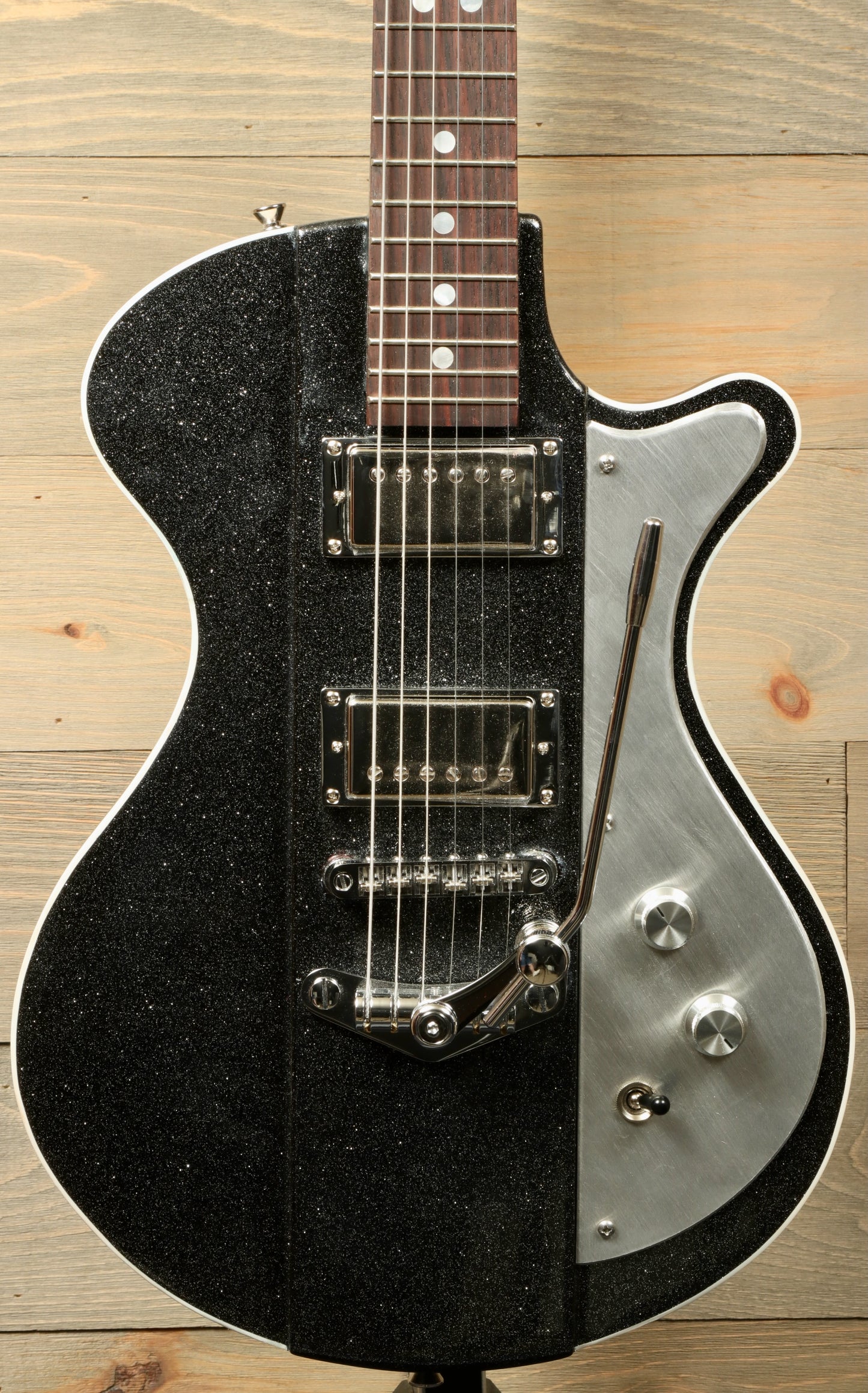 Weller Fleetwood Tremolo electric guitar in black sparkle finish, front view with chrome hardware