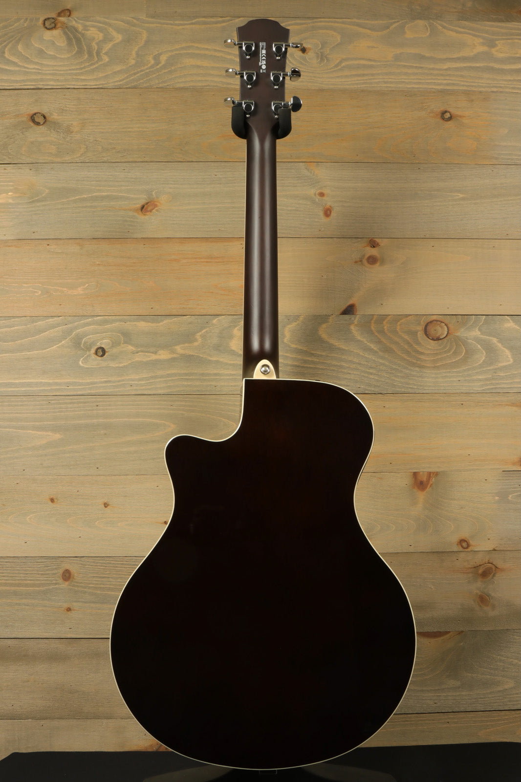 Yamaha APX600 FM with RoadRunner Gig Bag, dark finish, back view showing body contours
