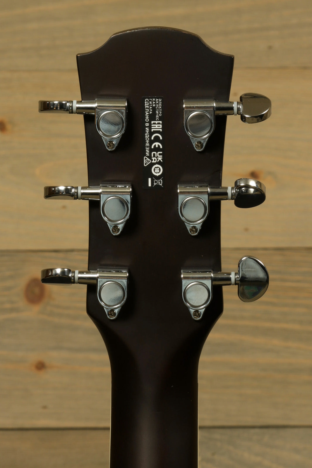 Yamaha APX600 FM with RoadRunner Gig Bag, dark finish, back of the headstock view