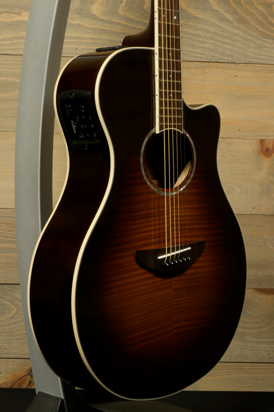 Yamaha APX600 FM acoustic electric guitar in brown sunburst finish, side view with RoadRunner Gig Bag