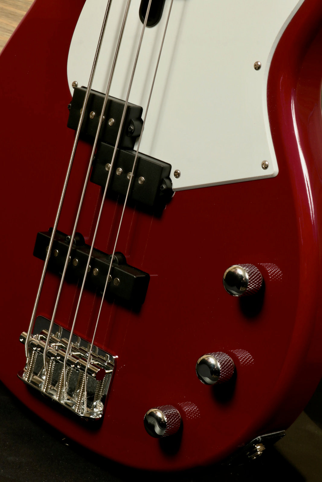 Yamaha BB234 4-String Electric Bass Guitar Raspberry Red, close-up view of the body and controls.
