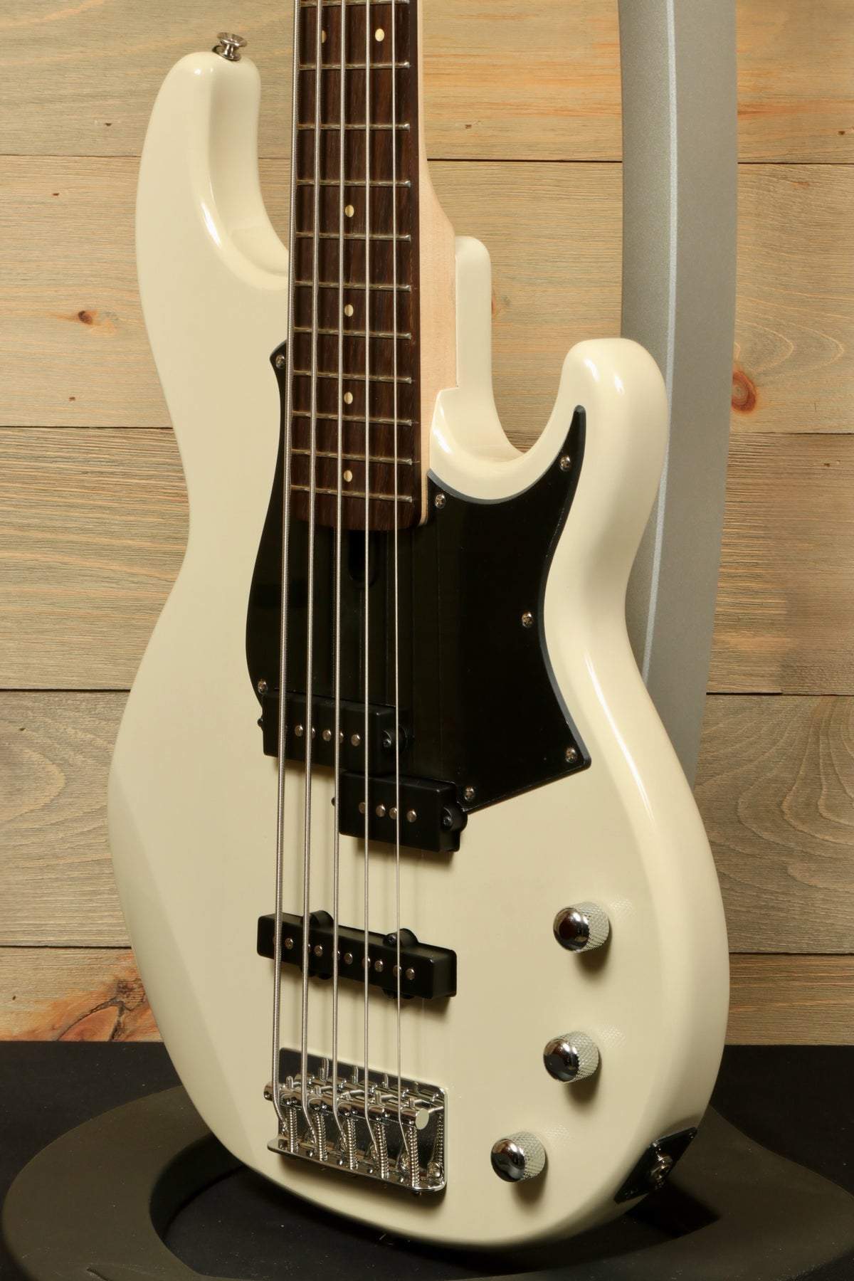 Yamaha BB235 5-String Electric Bass Guitar in white with black pickguard, side view
