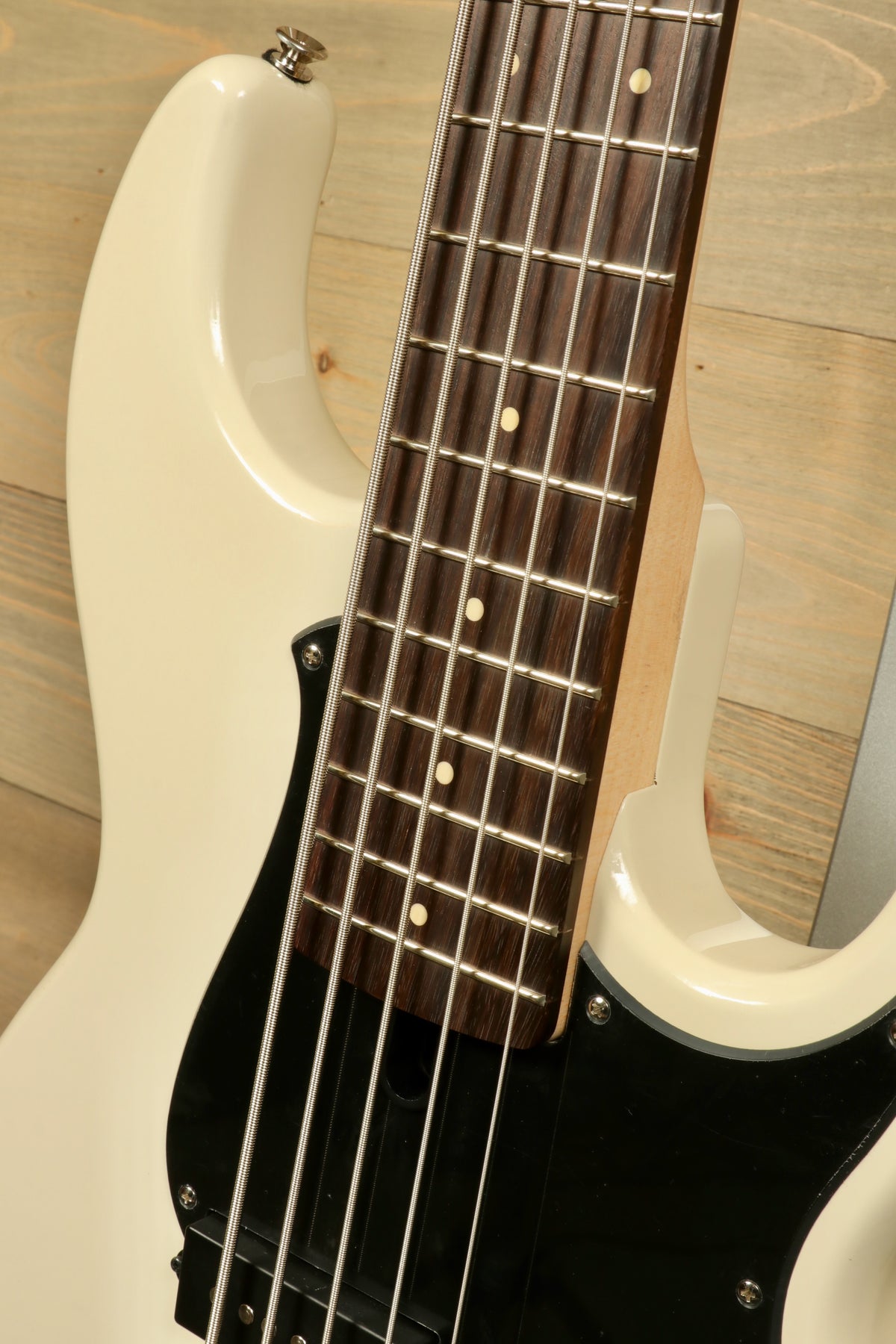 Yamaha BB235 5-String Electric Bass Guitar in cream color, close-up view of the fretboard