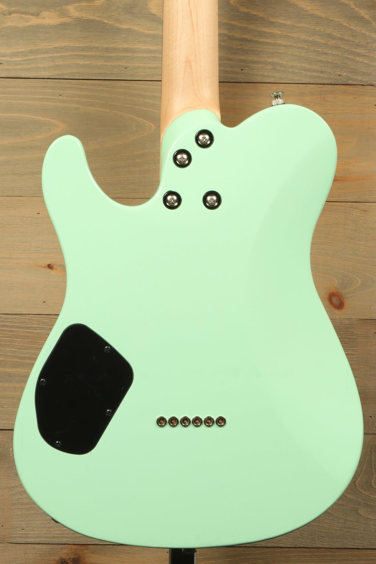 Yamaha Pacifica Peppermint Green, back view showing smooth finish and detailed hardware