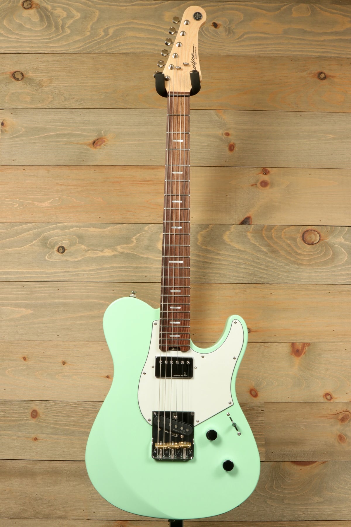 Yamaha Pacifica Peppermint Green electric guitar, front view showcasing its sleek design