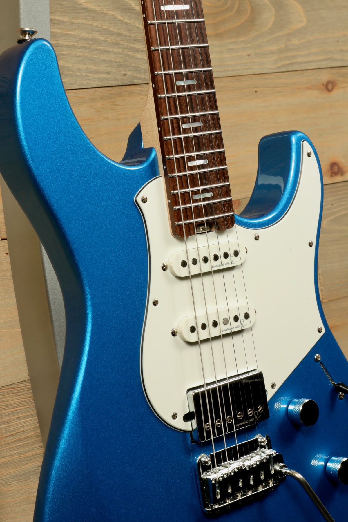 Yamaha Pacifica PACS+12 Standard Plus electric guitar in vibrant blue, front view showcasing the body and neck