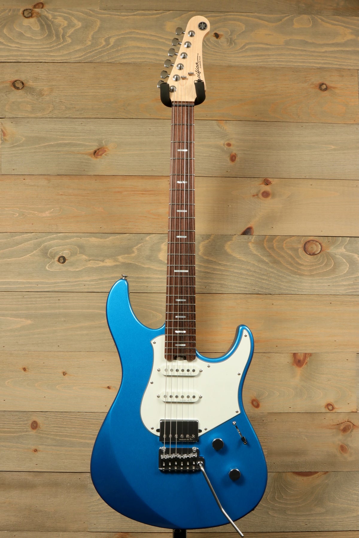 Yamaha Pacifica PACS+12 Standard Plus electric guitar in vibrant blue, front view against wood background