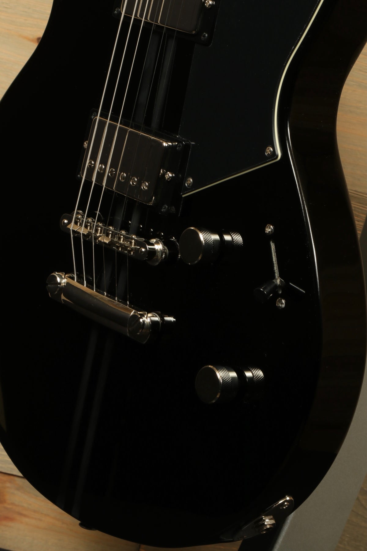 Yamaha Revstar Element RSE20 Electric Guitar Black, close-up view of body and controls