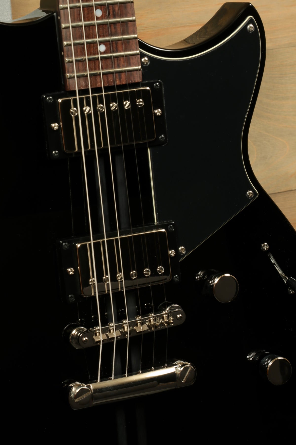 Yamaha Revstar Element RSE20 Electric Guitar Black, close-up view of body and neck