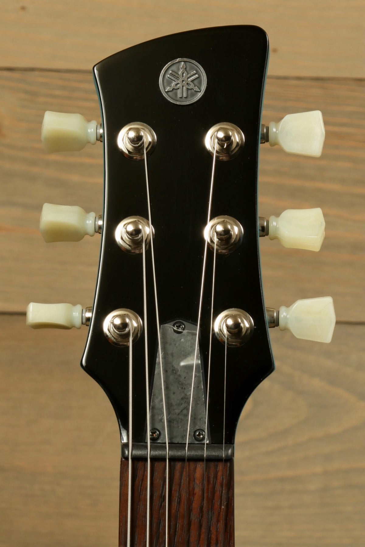 Yamaha Revstar Standard RSE20 Electric Guitar Swift Blue, headstock view with tuning pegs