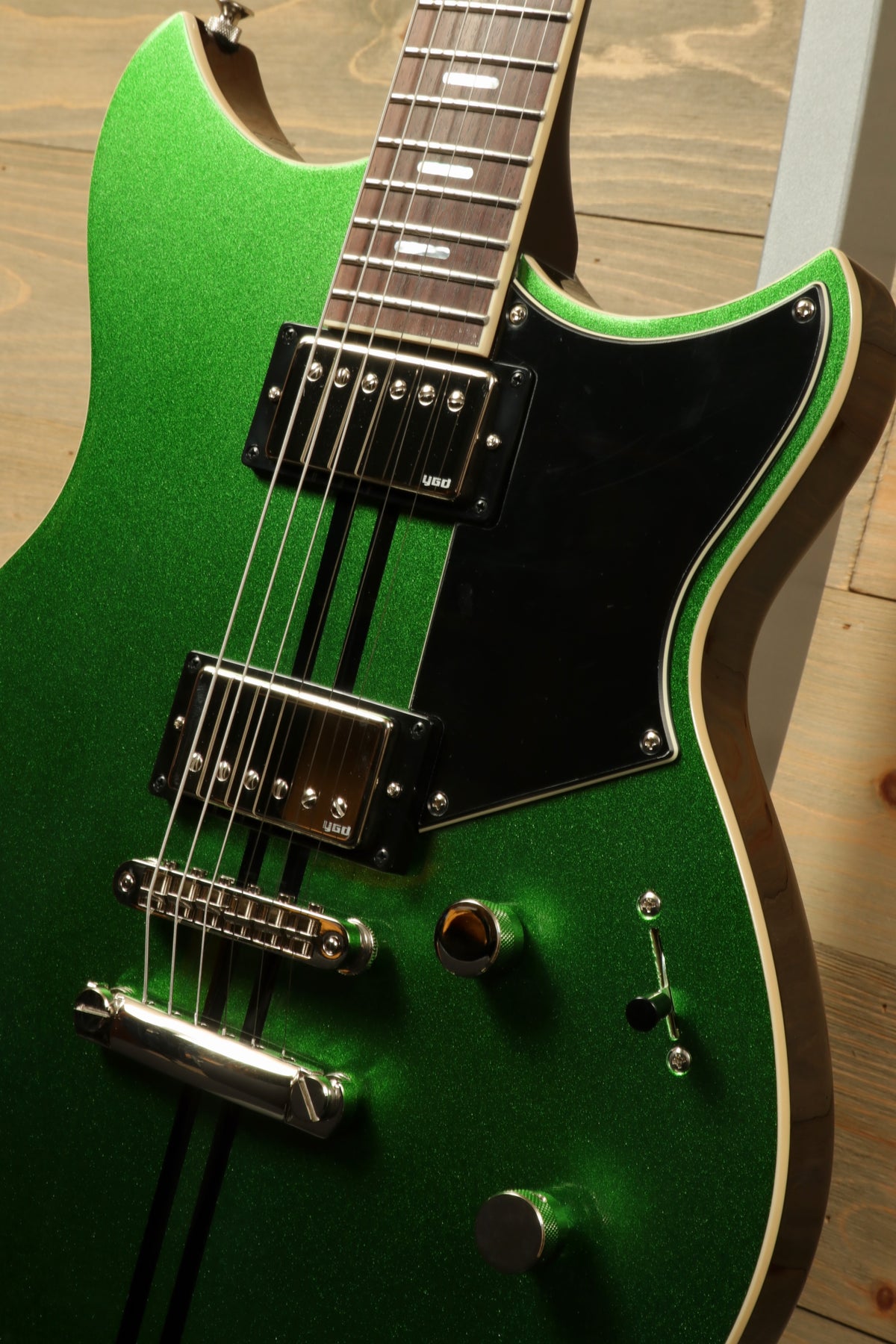 Yamaha Revstar Standard RSS20 electric guitar in vibrant green with black pickguard, top view