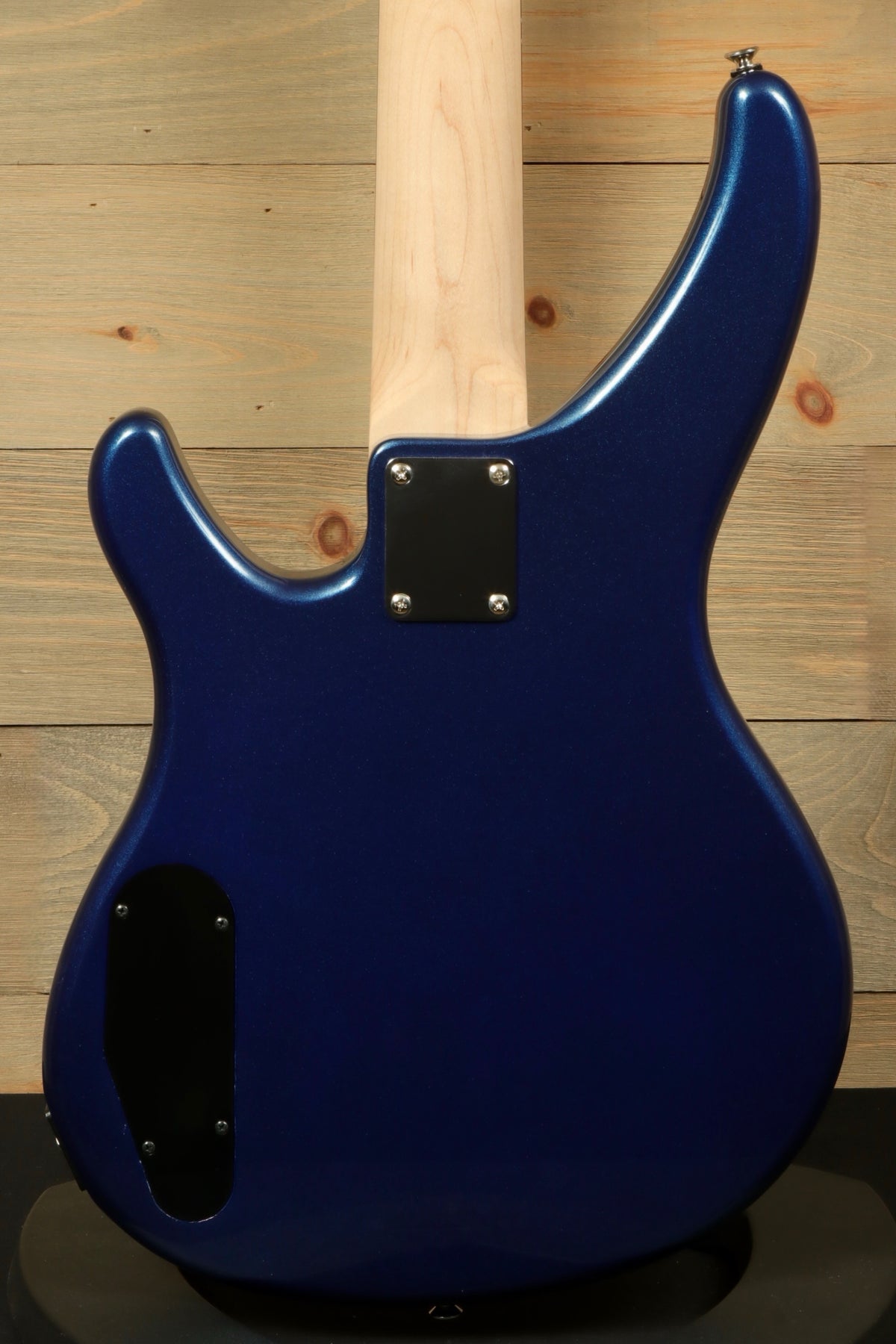 Yamaha TRBX174 electric bass guitar with a glossy blue finish, back view
