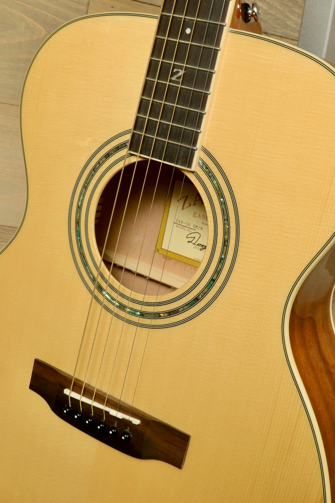 Zager ZAD-50 OM/N Acoustic Electric Guitar with Hardshell Case showing detailed craftsmanship