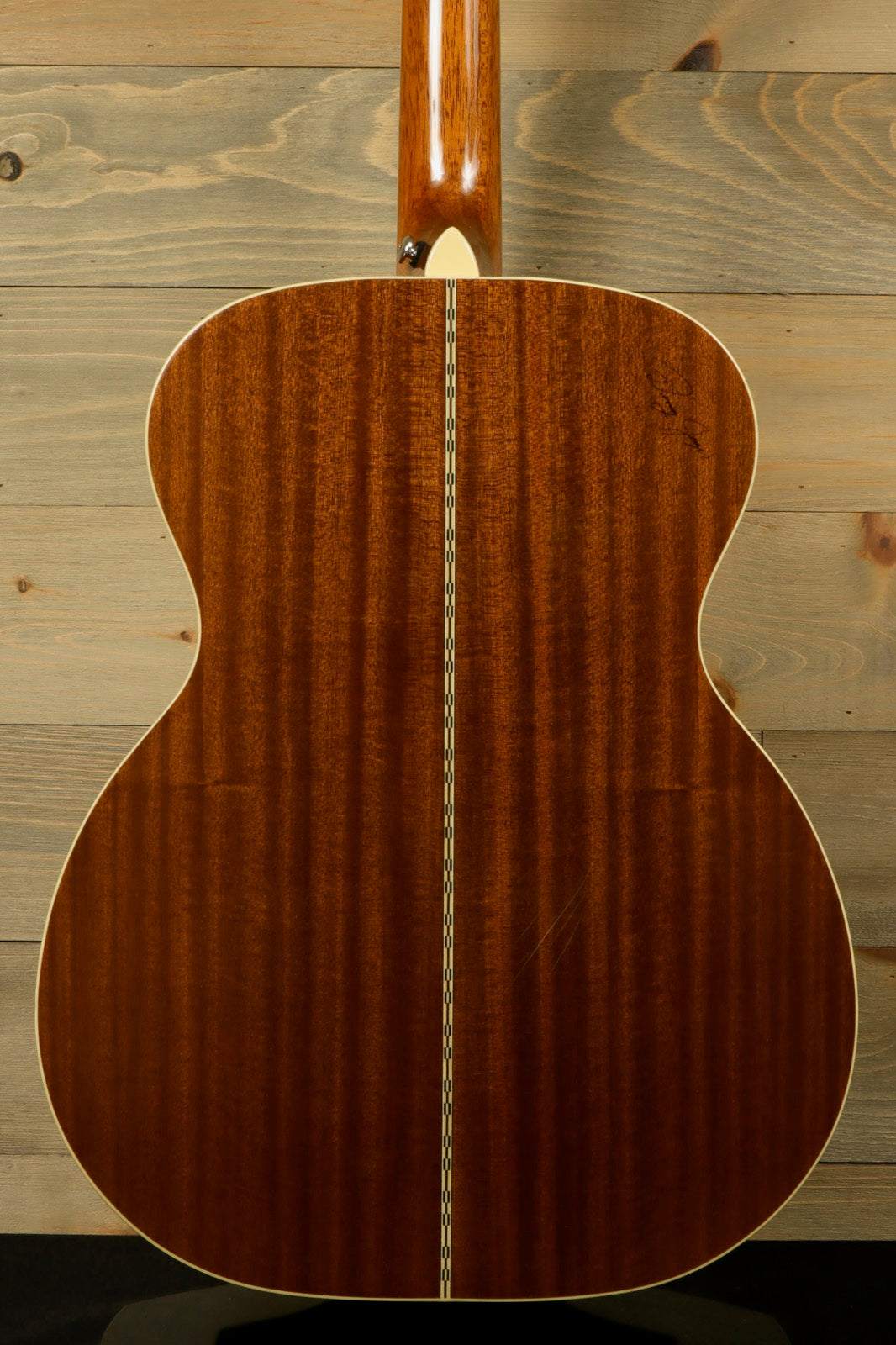 Back view of Zager ZAD-50 OM/N with Hardshell Case showcasing beautiful mahogany wood grain