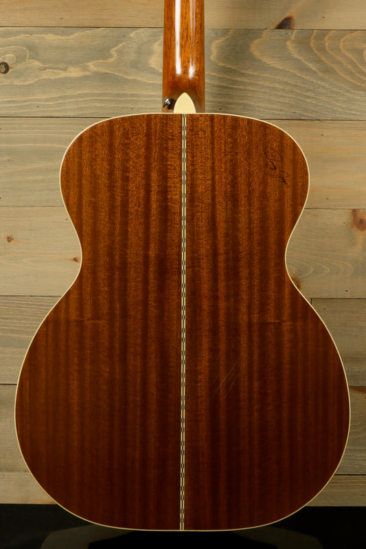 Back view of Zager ZAD-50 OM/N with Hardshell Case showcasing beautiful mahogany wood grain