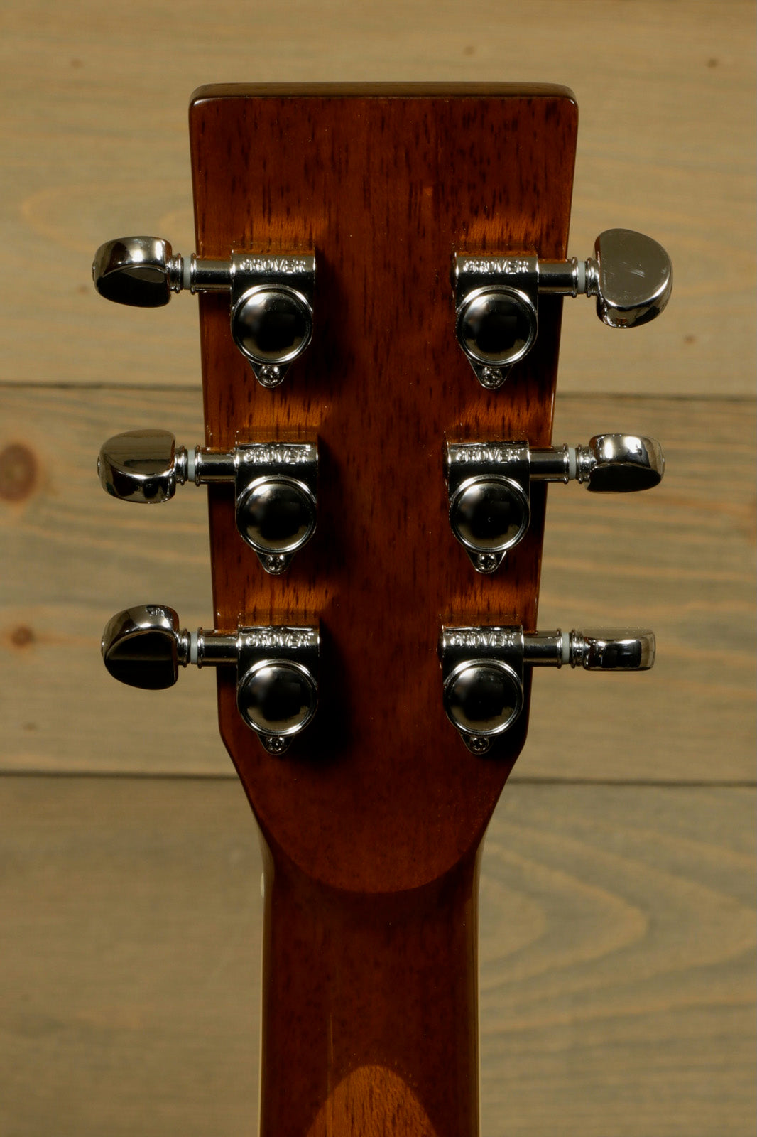 Close-up of the headstock of Zager ZAD-50 OM/N with Hardshell Case showing tuning pegs and finish detail