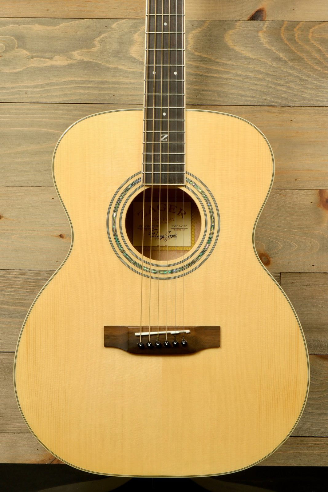 Zager ZAD-50 OM/N Acoustic Electric Guitar with Hardshell Case, featuring a natural wood finish and elegant design