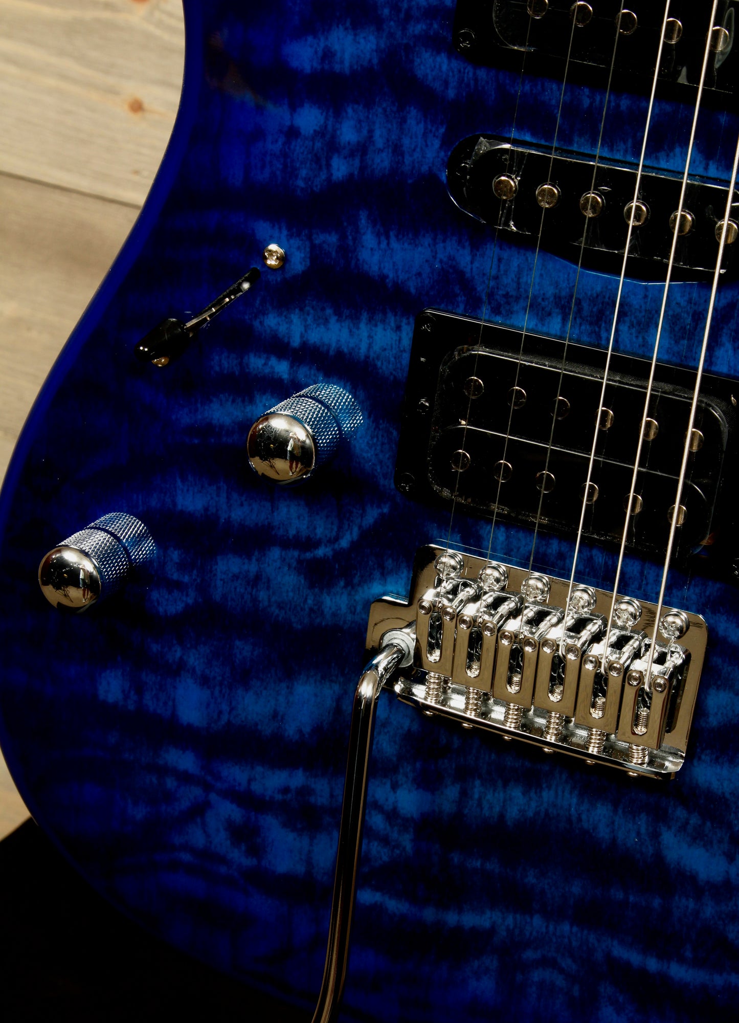 Ibanez GRX70QAL (Left-handed) - Transparent Blue Burst.